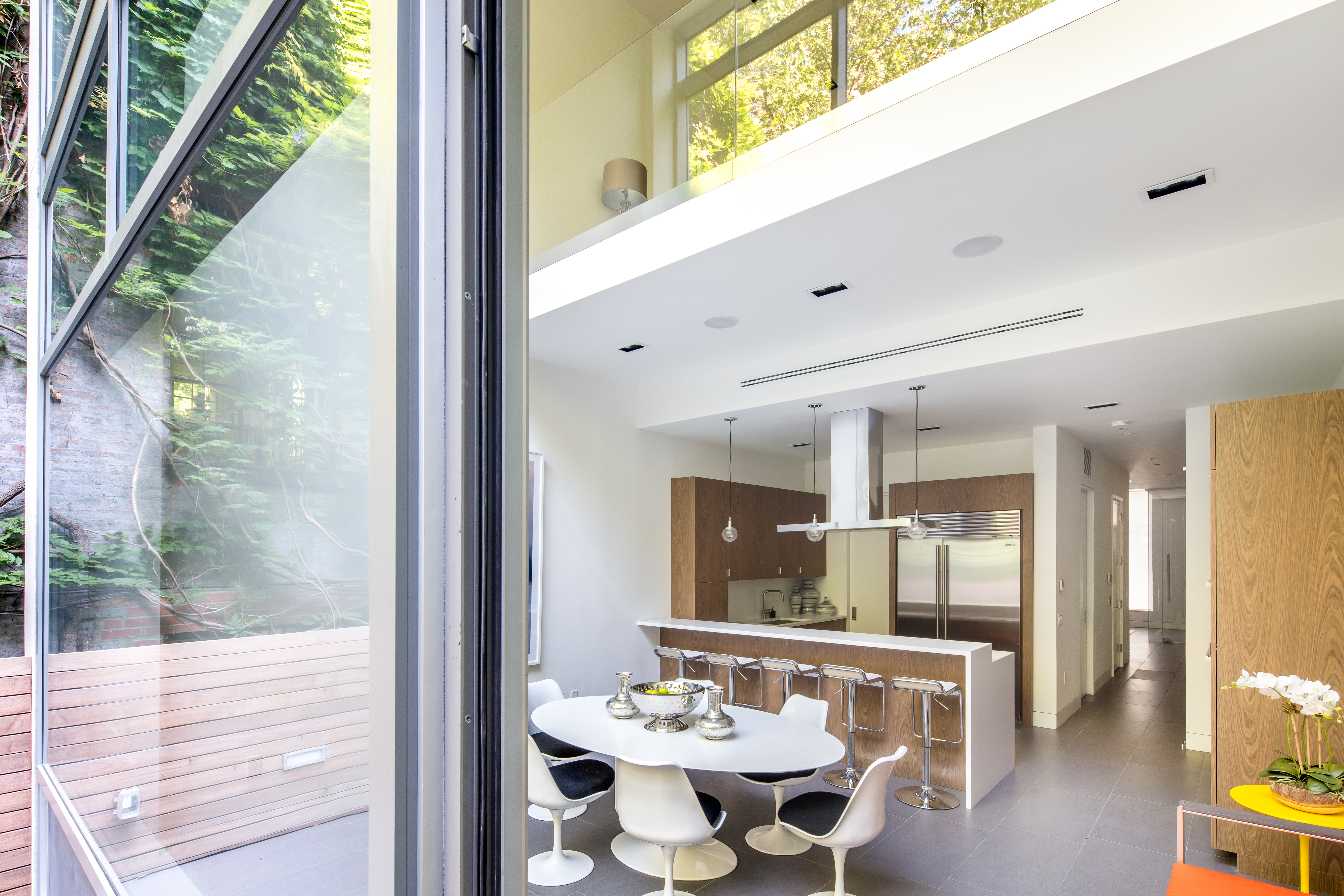 450 West 25th Street Manhattan, NY 10001 - Photo 3 of 16 a bathroom with a sink and a mirror