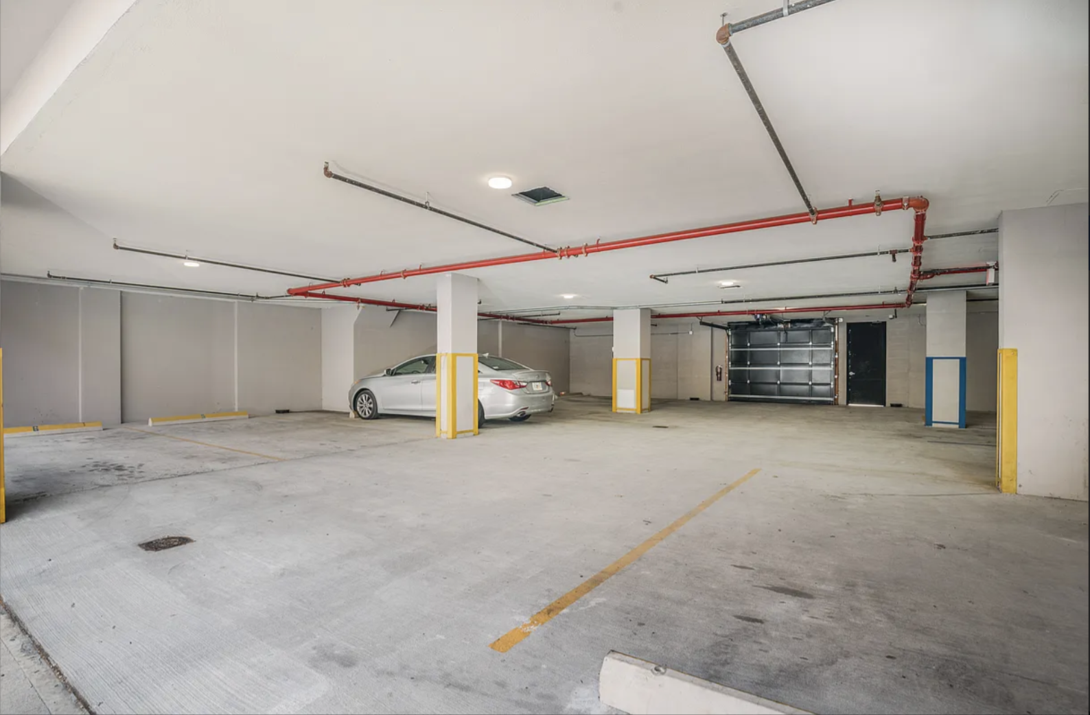 1325 Herkimer Street, Unit 302 Brooklyn, NY 11233 - Photo 8 of 10 a view of a livingroom with furniture and a window