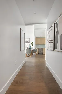 17 Convent Avenue, Unit 3D Manhattan, NY 10027 - Photo 5 of 9 a living room with furniture and a large window