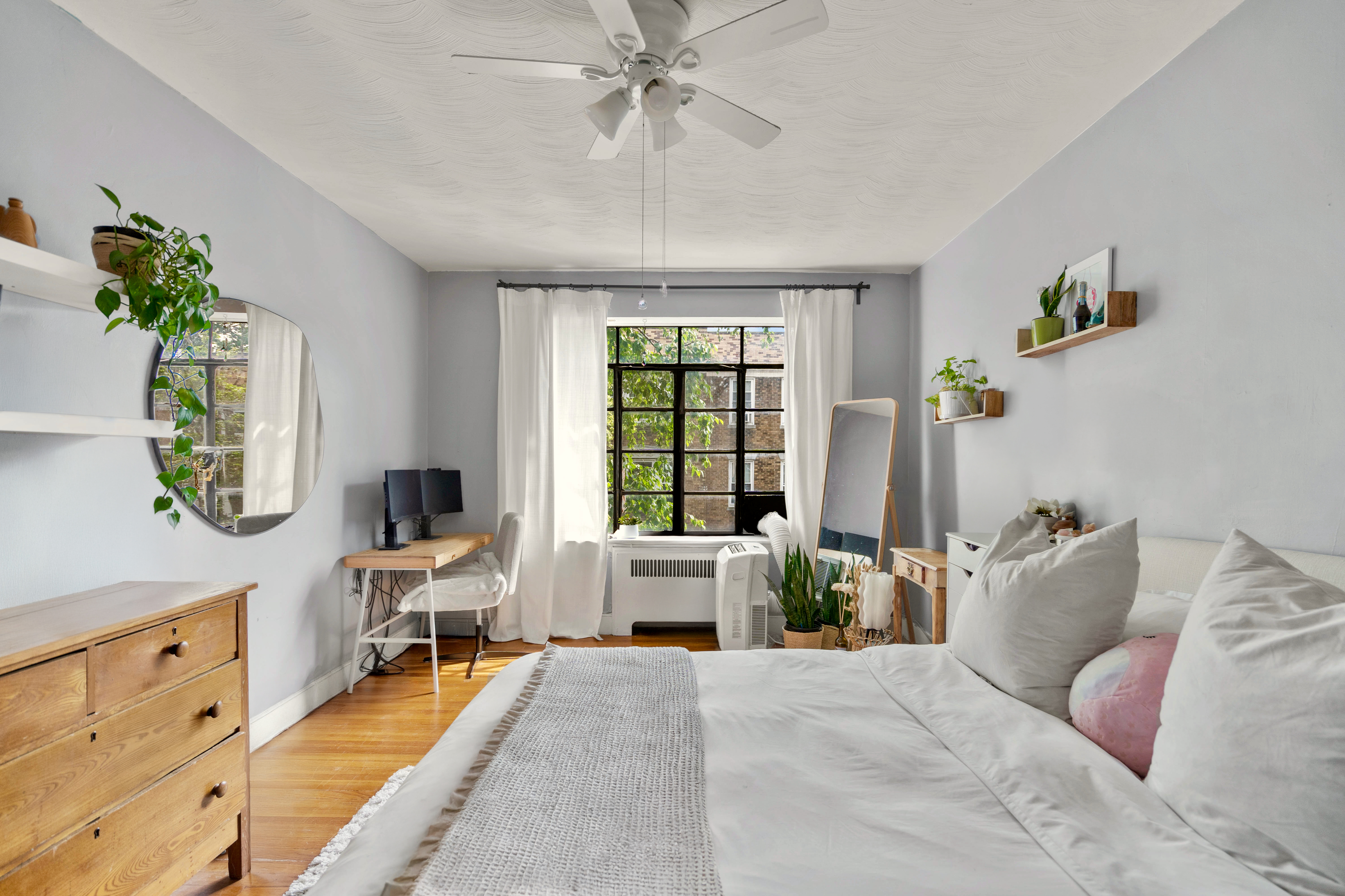 93 Strathmore Road, Unit 8 Brighton, MA 02135 - Photo 6 of 16 a bedroom with furniture and a window