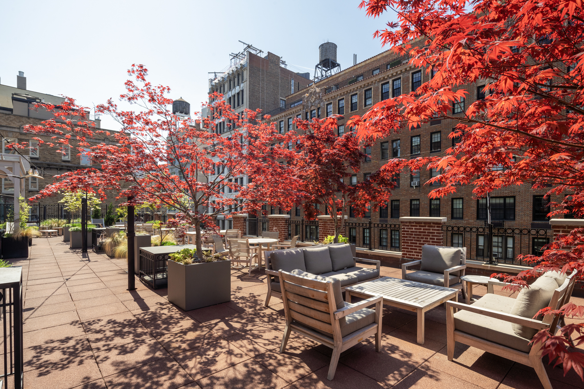 23 East 10th Street, Unit 508 Manhattan, NY 10003 - Photo 18 of 21 a patio with table and chairs