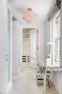 a room with table and chairs