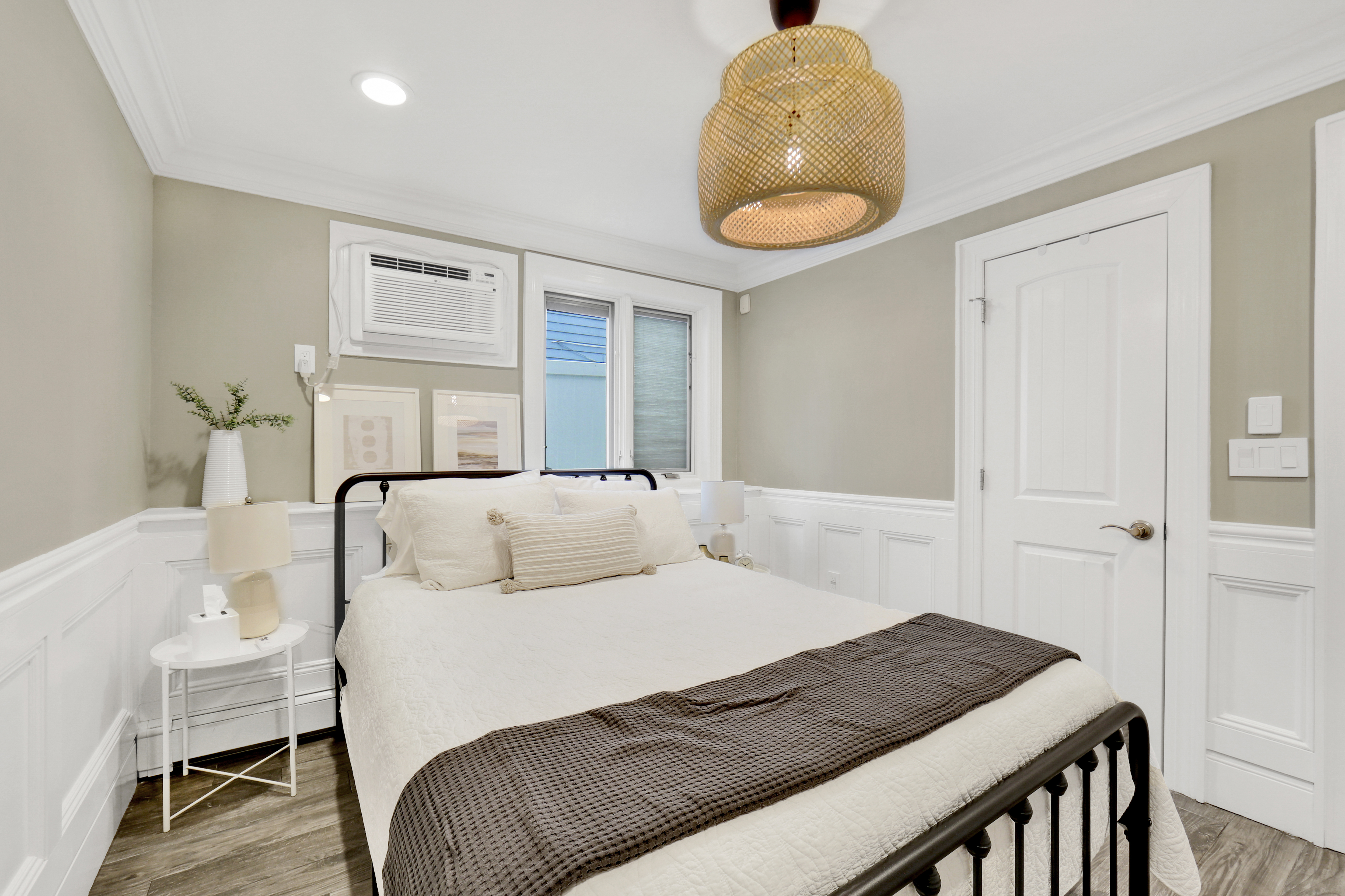 1-69 Beach 98th Street, Unit 1 Queens, NY 11694 - Photo 12 of 23 a bedroom with a bed and a window