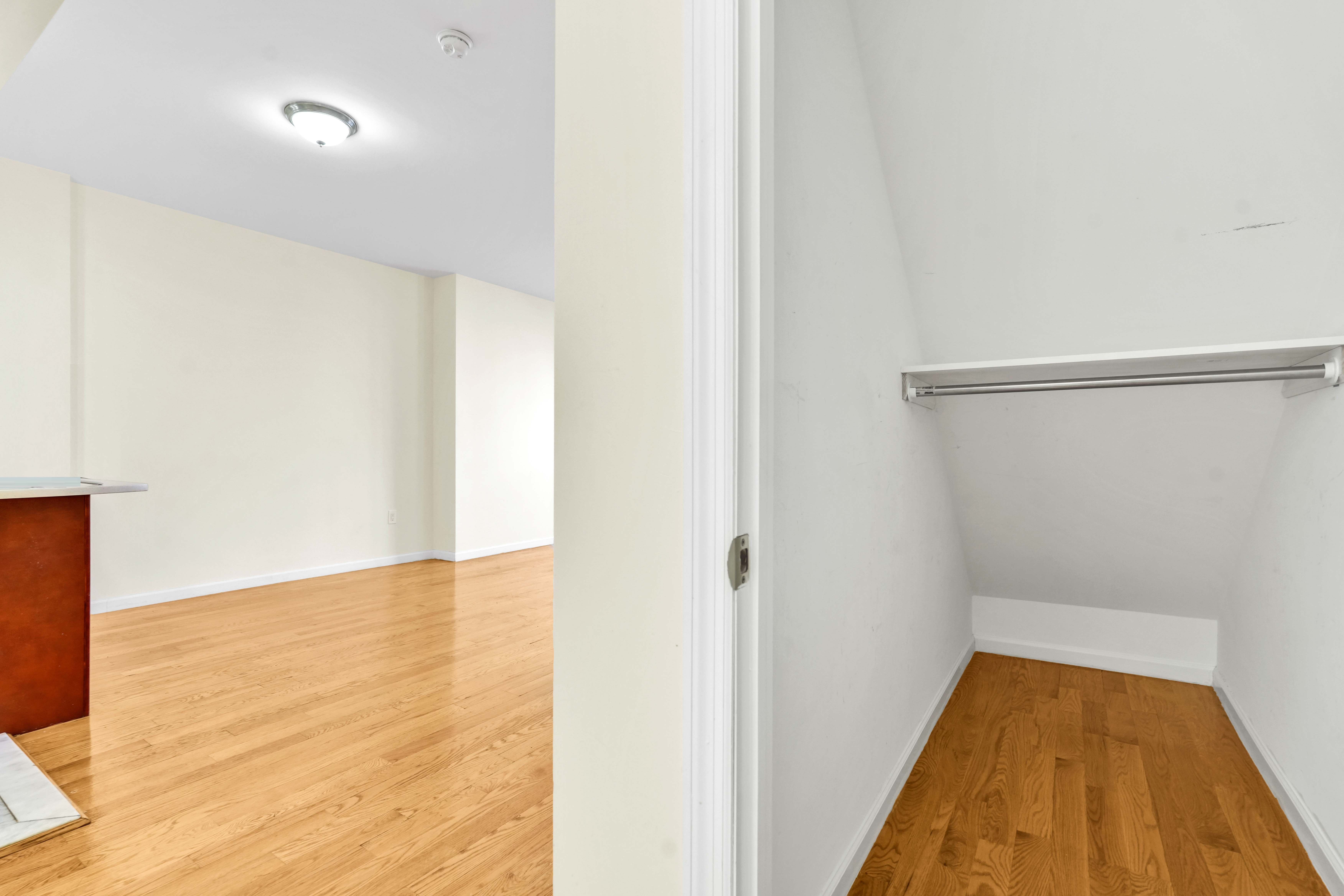 1892 Bergen Street, Unit 2 Brooklyn, NY 11233 - Photo 21 of 24 a view of a room with wooden floor and glass door