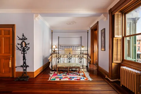 a front view of a house with balcony