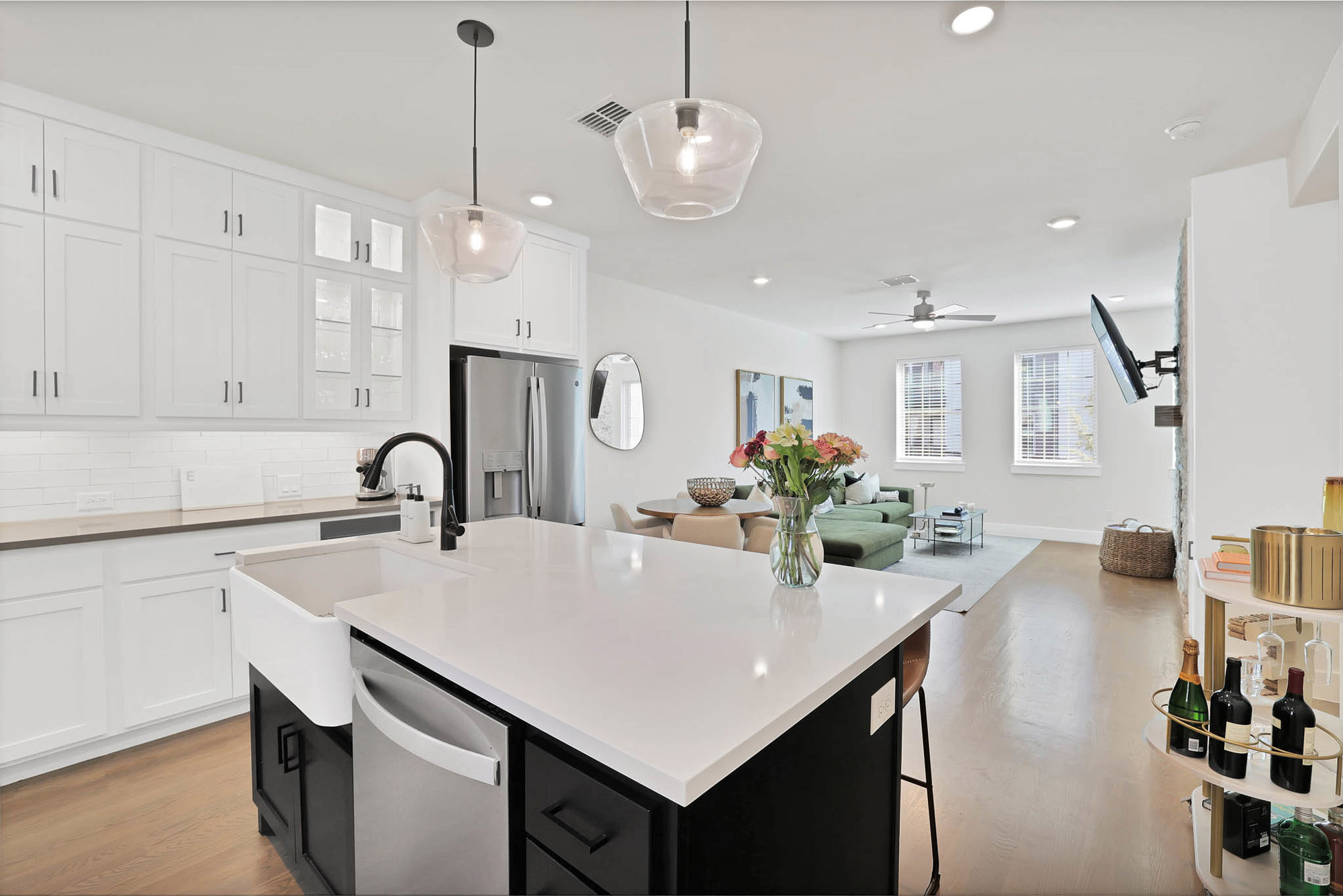 3920 Riesling Ridge Dallas, TX 75204 - Photo 6 of 26 a kitchen with stainless steel appliances a table chairs and cabinets