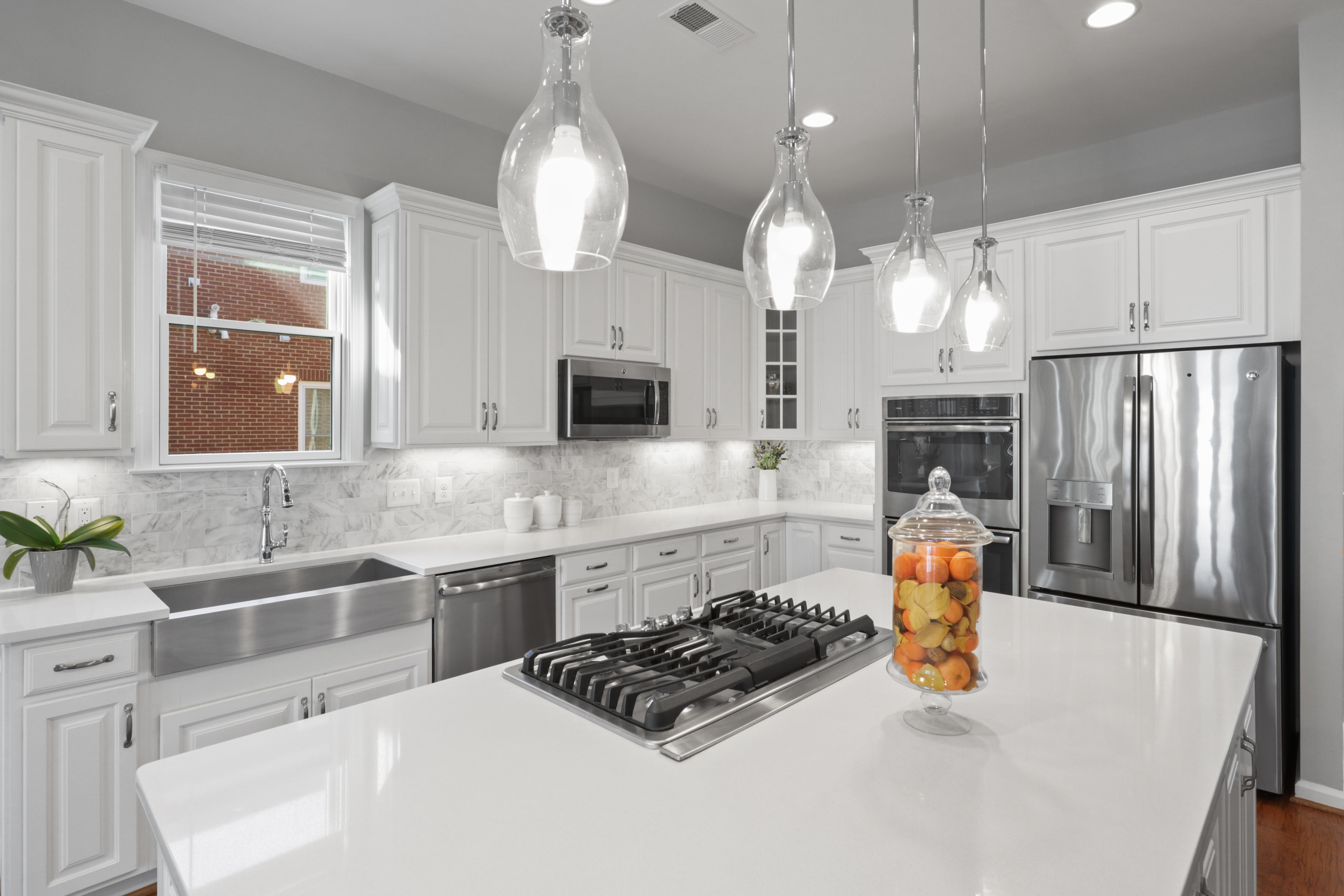 9101 Power House Road Lorton, VA 22079 - Photo 20 of 75 a kitchen with stainless steel appliances a sink a stove a refrigerator and cabinets