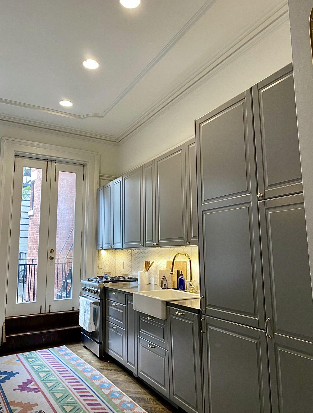 94 Joralemon Street, Unit 2 Brooklyn, NY 11201 - Photo 4 of 15 a kitchen with a refrigerator and a sink