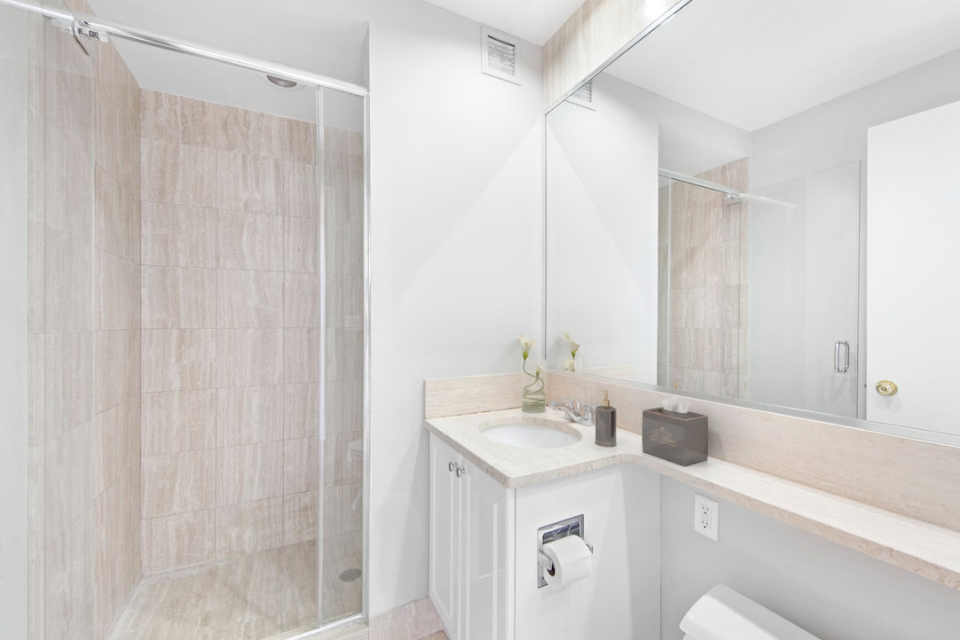 220 Riverside Boulevard, Unit 39B Manhattan, NY 10069 - Photo 10 of 16 a bathroom with a sink and a mirror