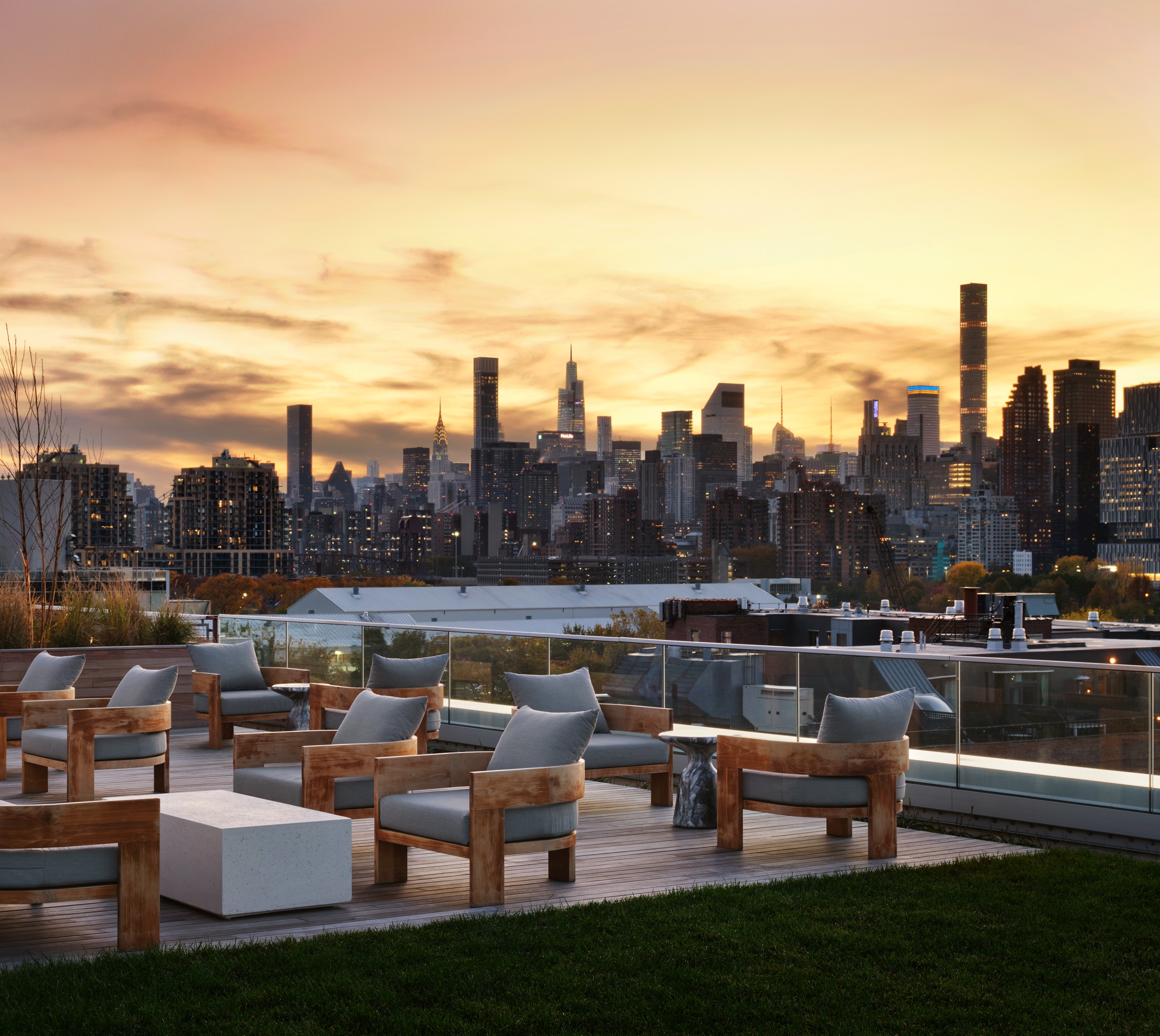 30-77 Vernon Boulevard, Unit 514W Queens, NY 11102 - Photo 8 of 21 a view of a lake with couches and city view