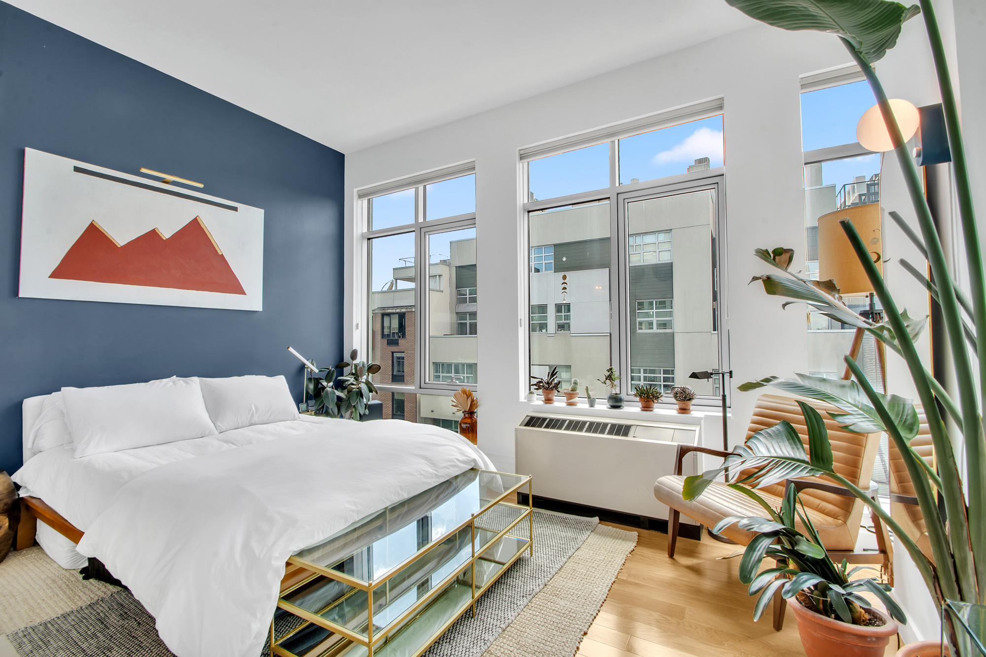 101 North 5th Street, Unit 5A Brooklyn, NY 11249 - Photo 12 of 26 a bedroom with a bed and a large window