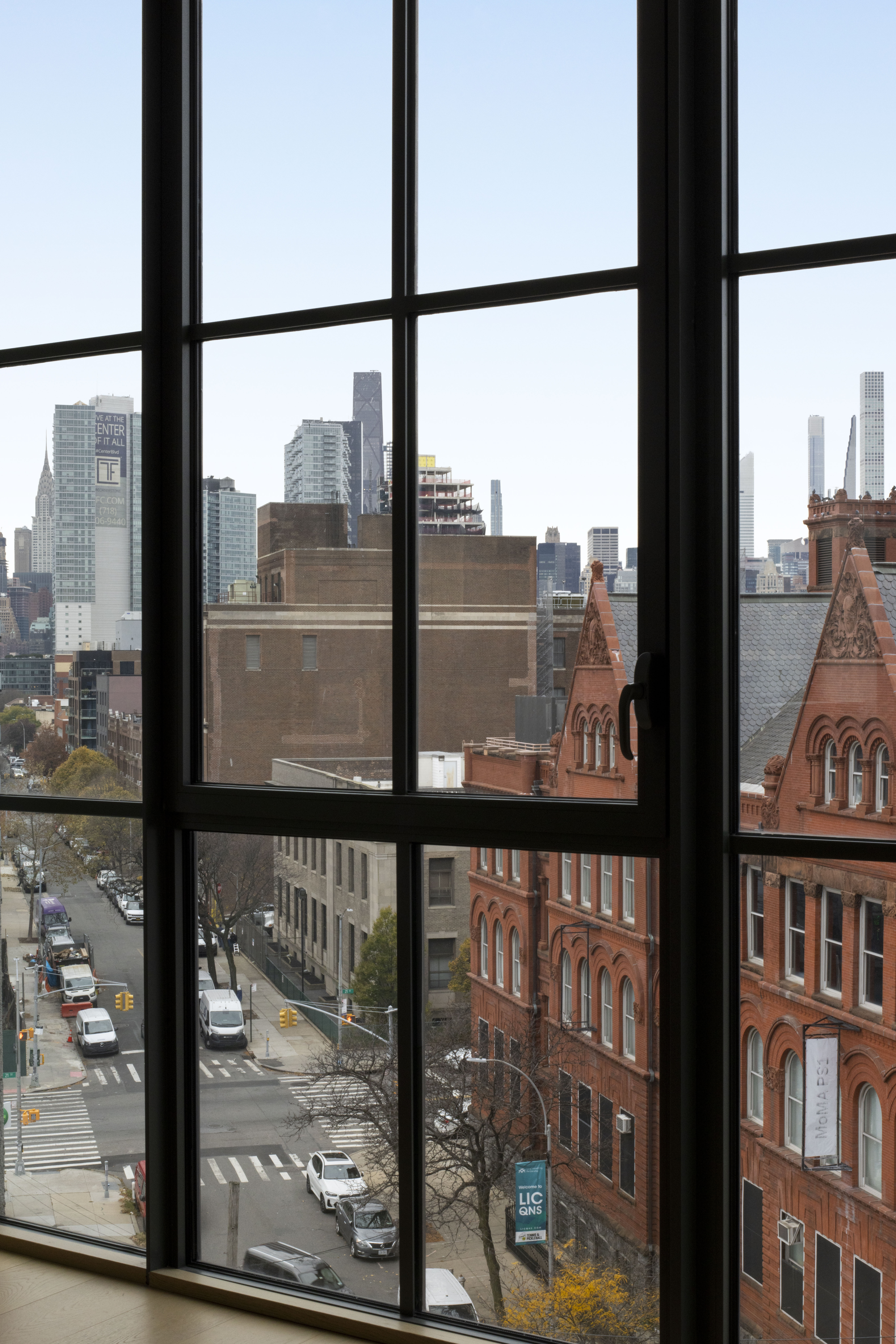 22-18 Jackson Avenue, Unit 719 Queens, NY 11101 - Photo 9 of 12 a view of a city from a window