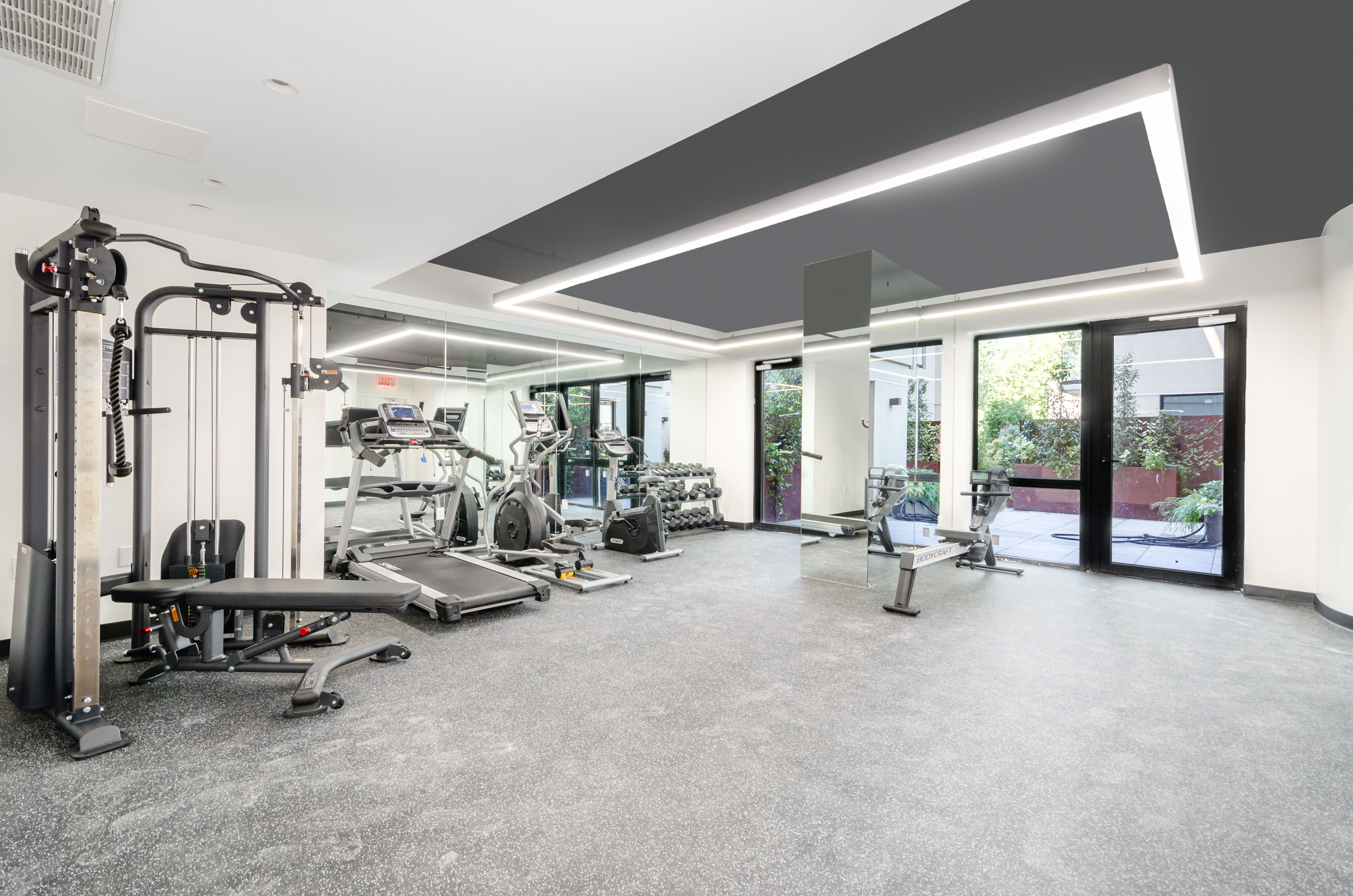 435 Tompkins Avenue, Unit 304S Brooklyn, NY 11216 - Photo 10 of 15 a view of a room with gym equipment
