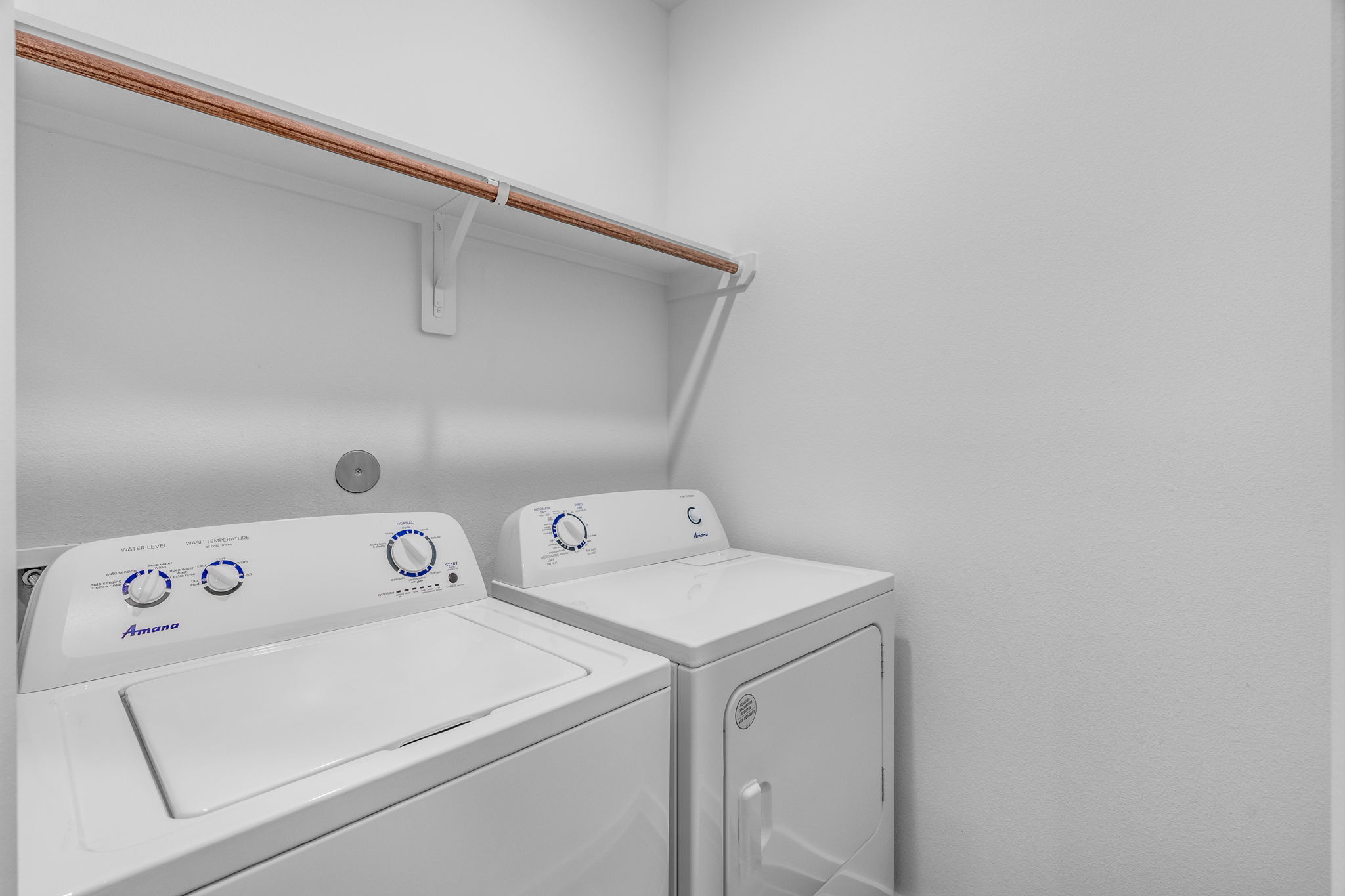 11303 Stonework Grv Lane Houston, TX 77076 - Photo 29 of 39 a utility room with dryer and washer