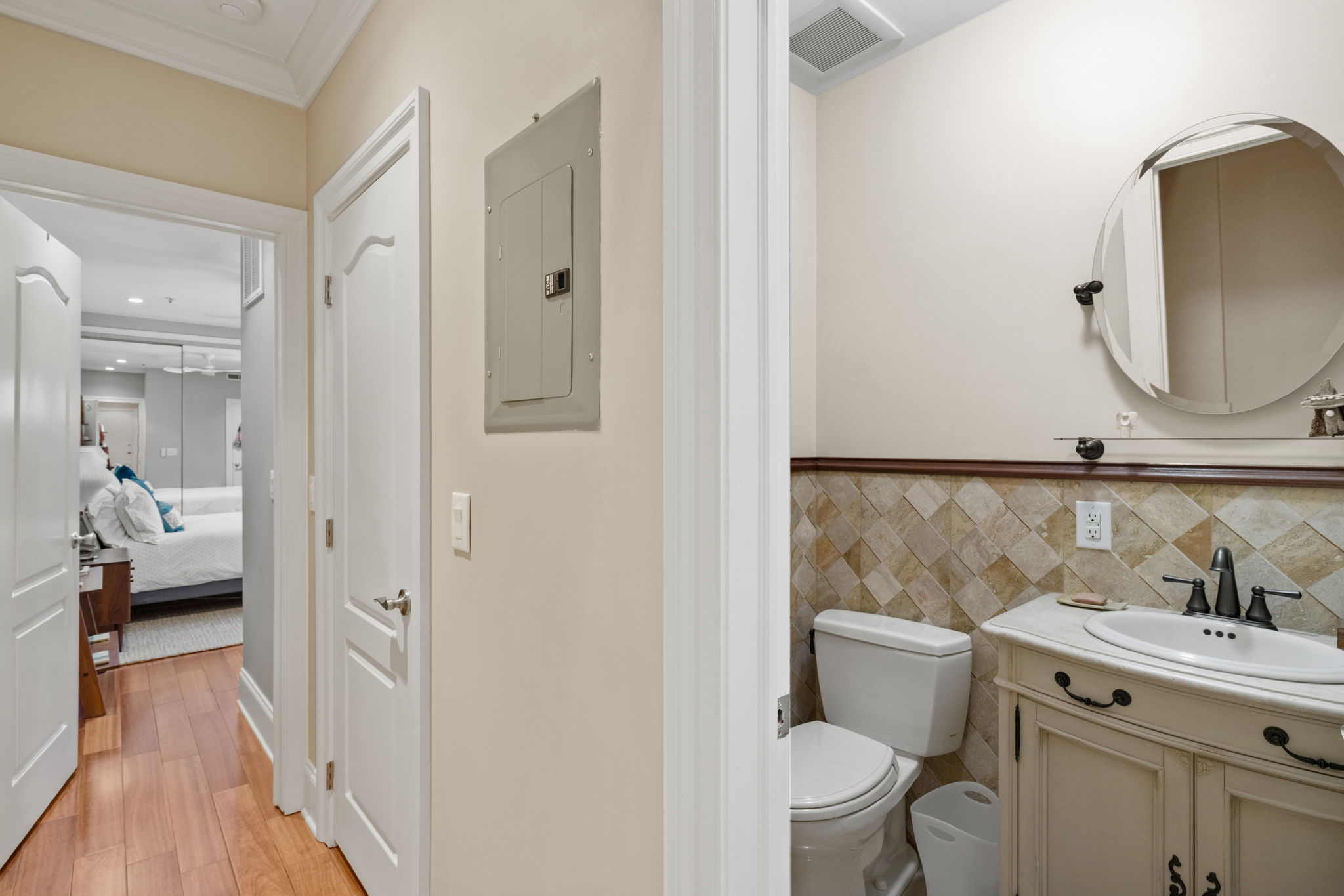 2049 Walnut Street, Unit 1R Philadelphia, PA 19103 - Photo 10 of 18 a en suite bathroom with a toilet sink and mirror
