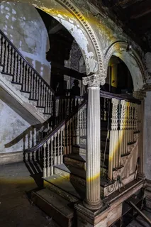 a view of entryway door with wooden floor