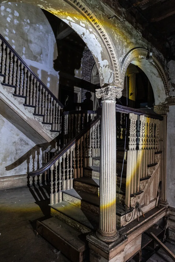 a view of entryway door with wooden floor