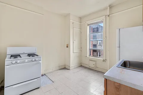 a view of a storage & utility room with washer and dryer