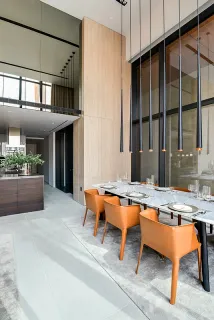 a swimming pool with outdoor seating and outdoor seating