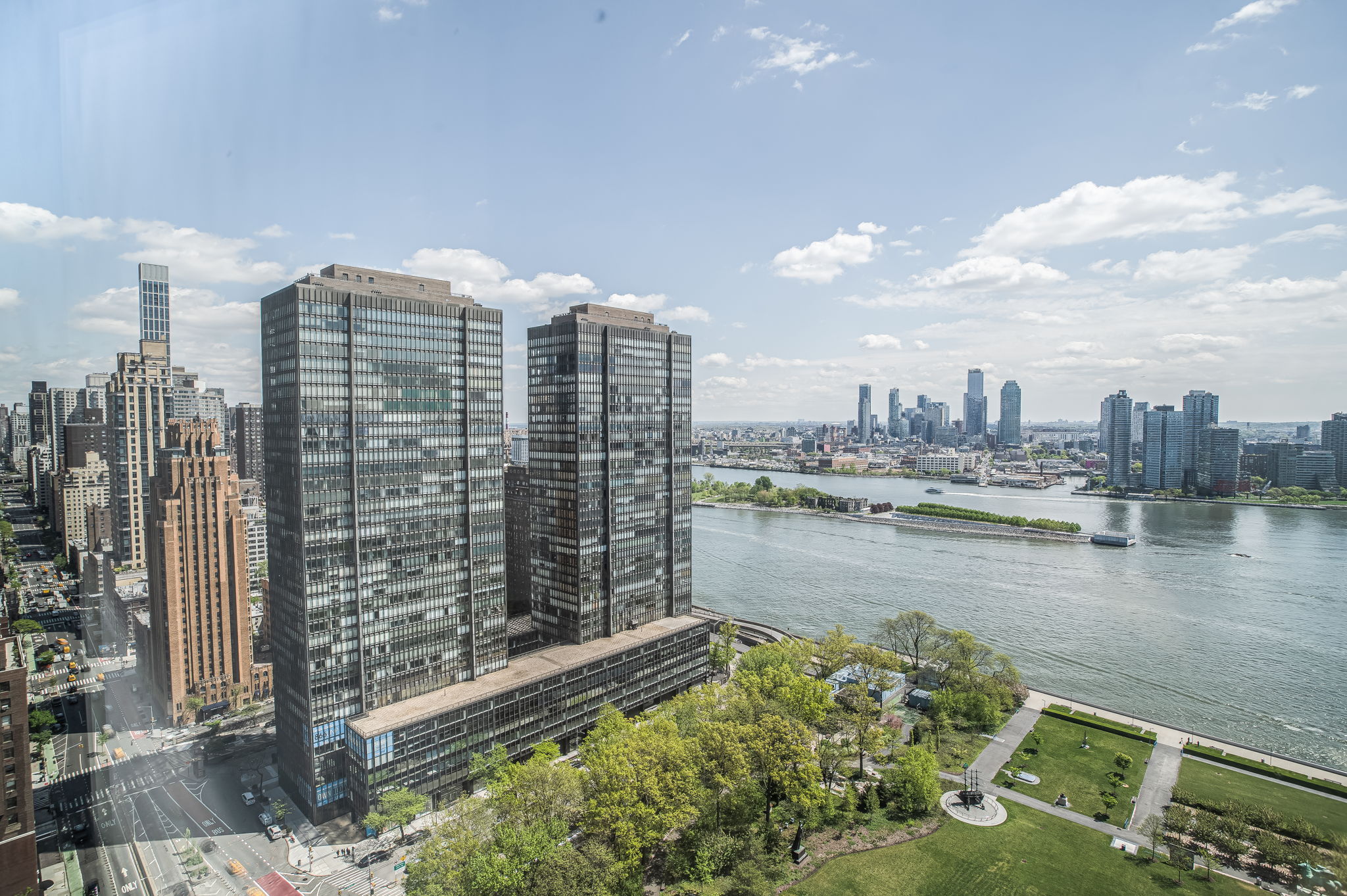 50 United Nations Plaza, Unit 26B Manhattan, NY 10017 - Photo 9 of 25 a view of a city with tall buildings