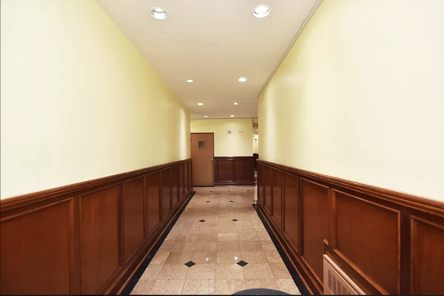 305 East 95th Street, Unit 4E Manhattan, NY 10128 - Photo 10 of 12 a view of gallery with wooden floor