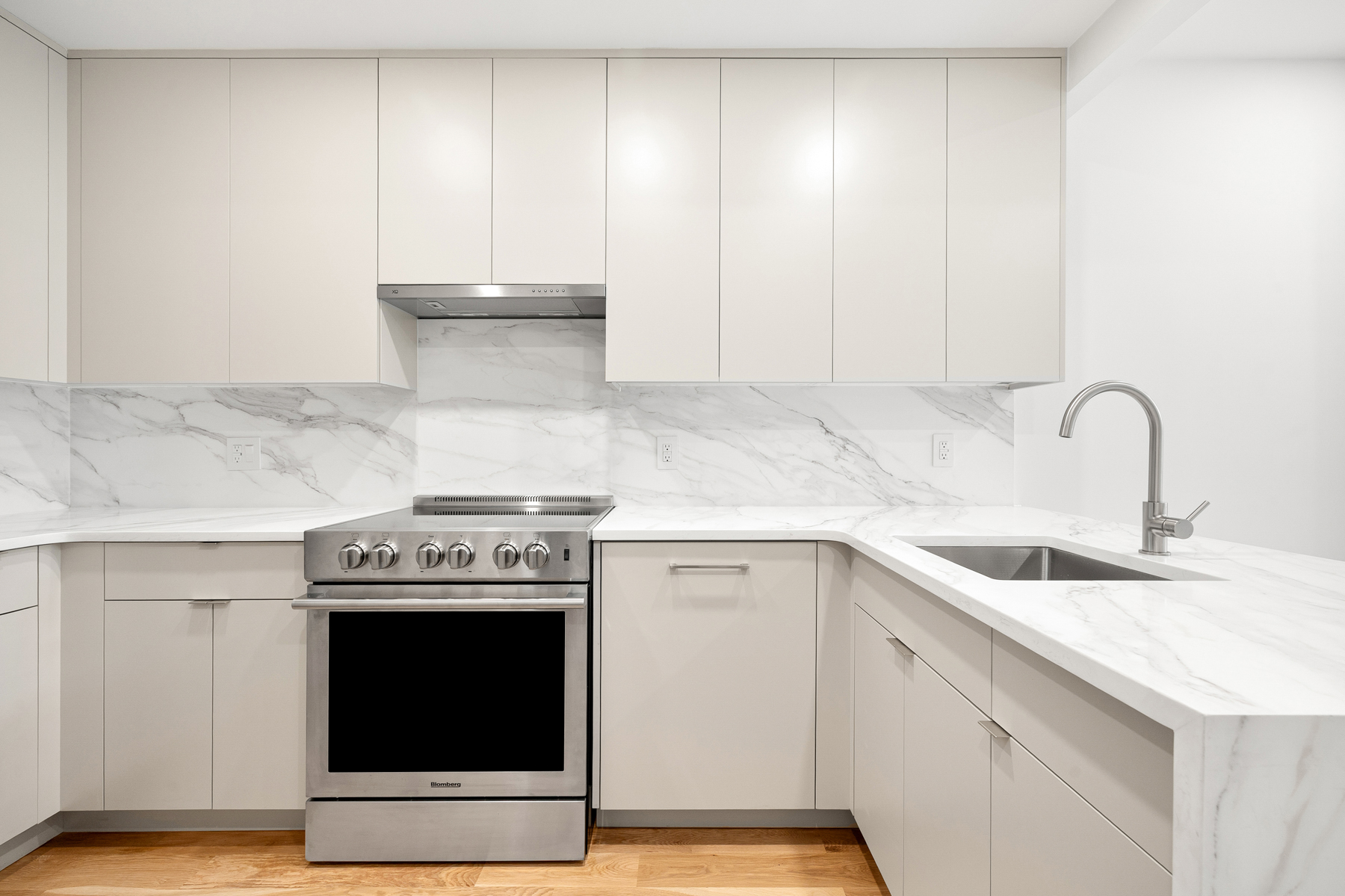 1155 Bedford Avenue, Unit 3F Brooklyn, NY 11216 - Photo 7 of 12 a kitchen with a stove and a sink