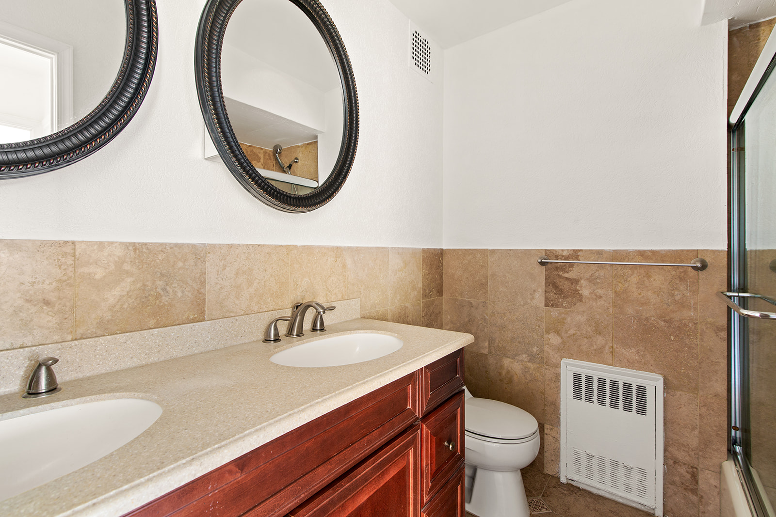 572 92nd Street Brooklyn, NY 11209 - Photo 7 of 20 a bathroom with a sink and a mirror