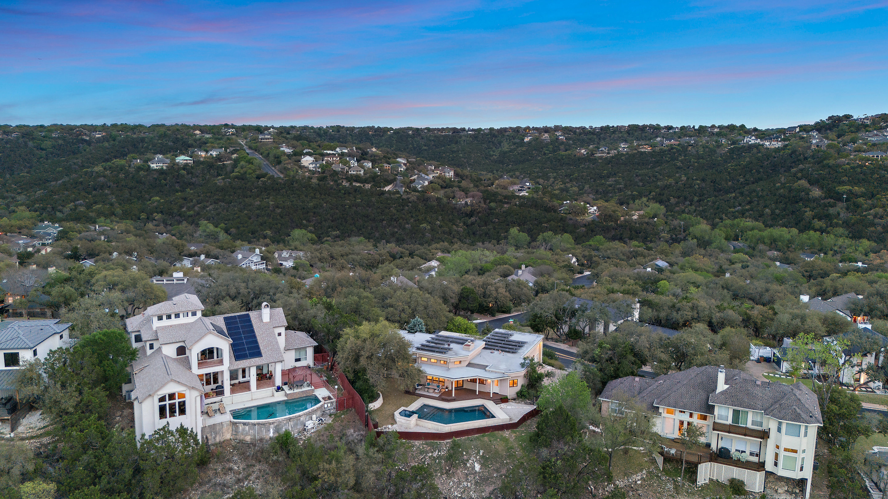 5319 Backtrail Drive Austin, TX 78731 - Photo 5 of 35 an aerial view of residential houses with outdoor space and trees