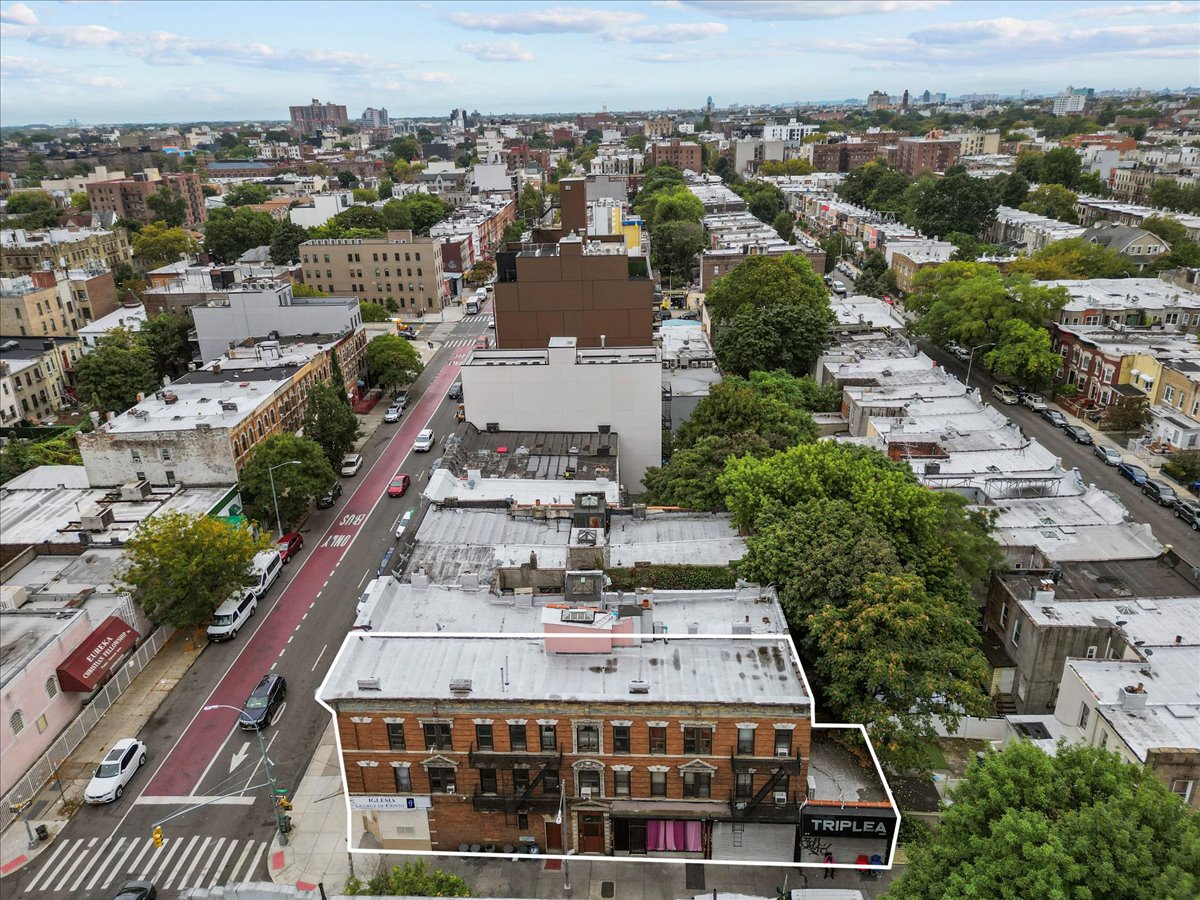 1056 Rogers Avenue Brooklyn, NY 11226 - Photo 5 of 9 an aerial view of a multi story parking building and outdoor space