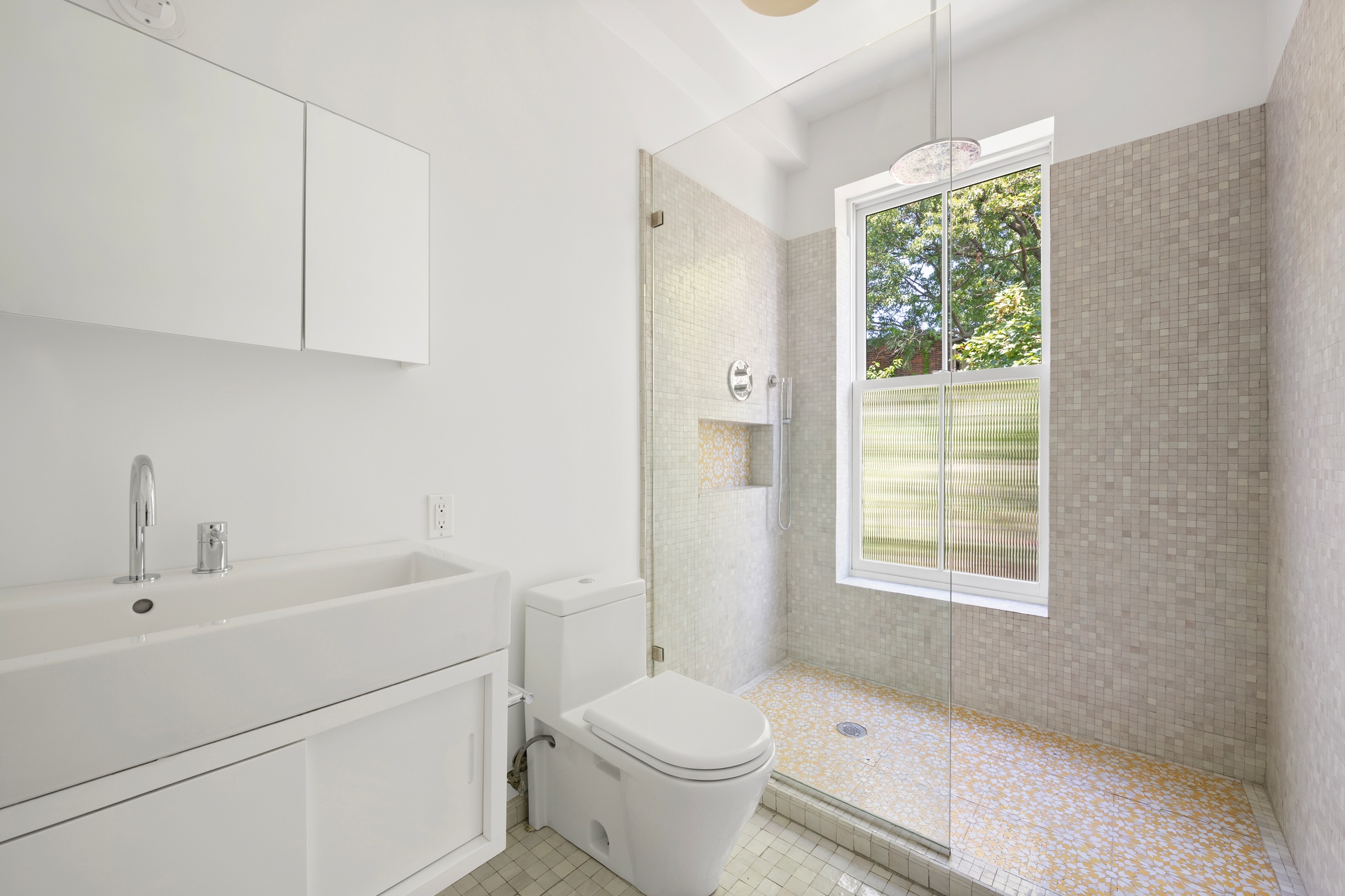 73 St James Place, Unit 2 Brooklyn, NY 11238 - Photo 11 of 15 a bathroom with a sink toilet and shower