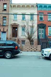 a car parked in front of a building