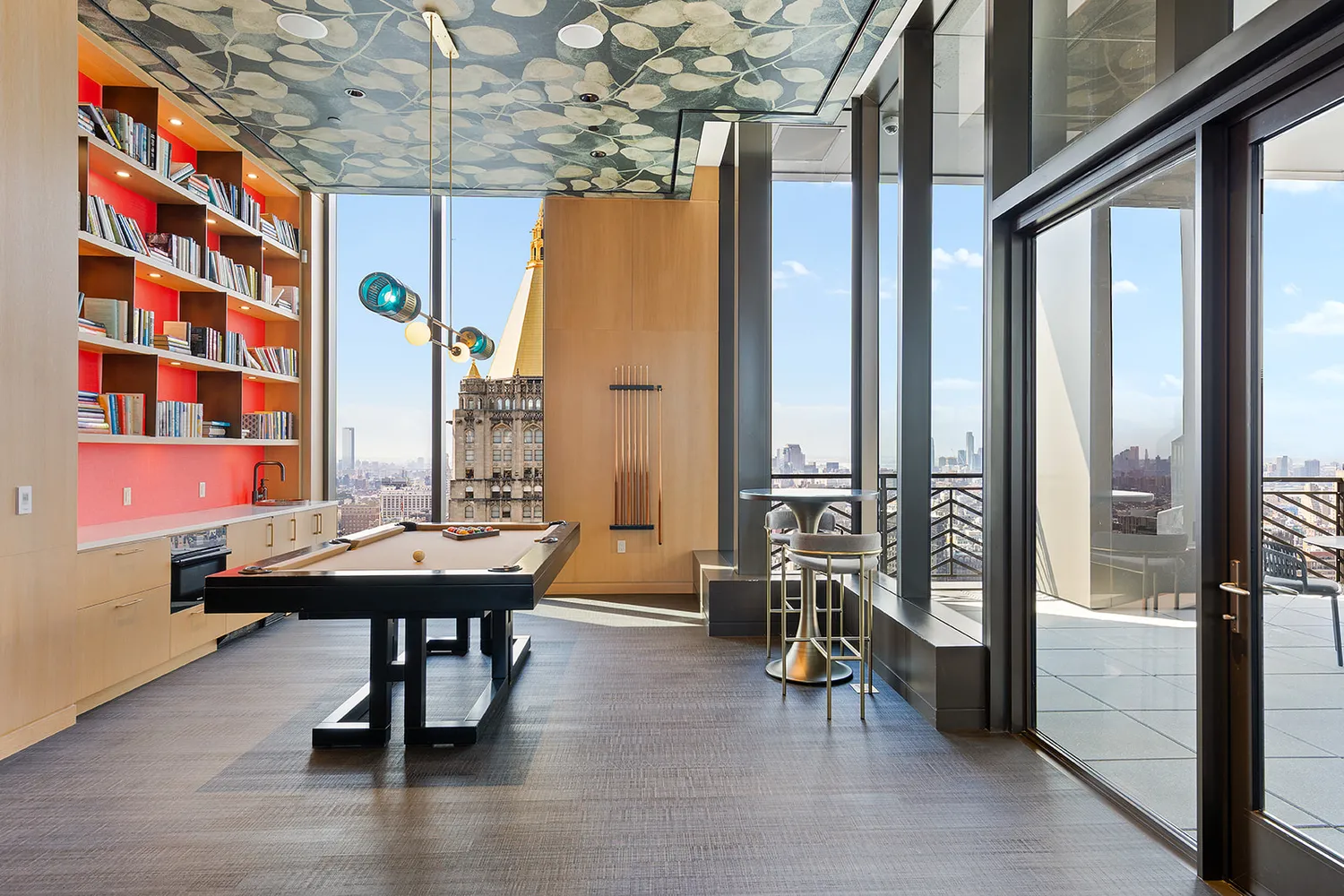 a view of a room with lots of furniture and wooden floor