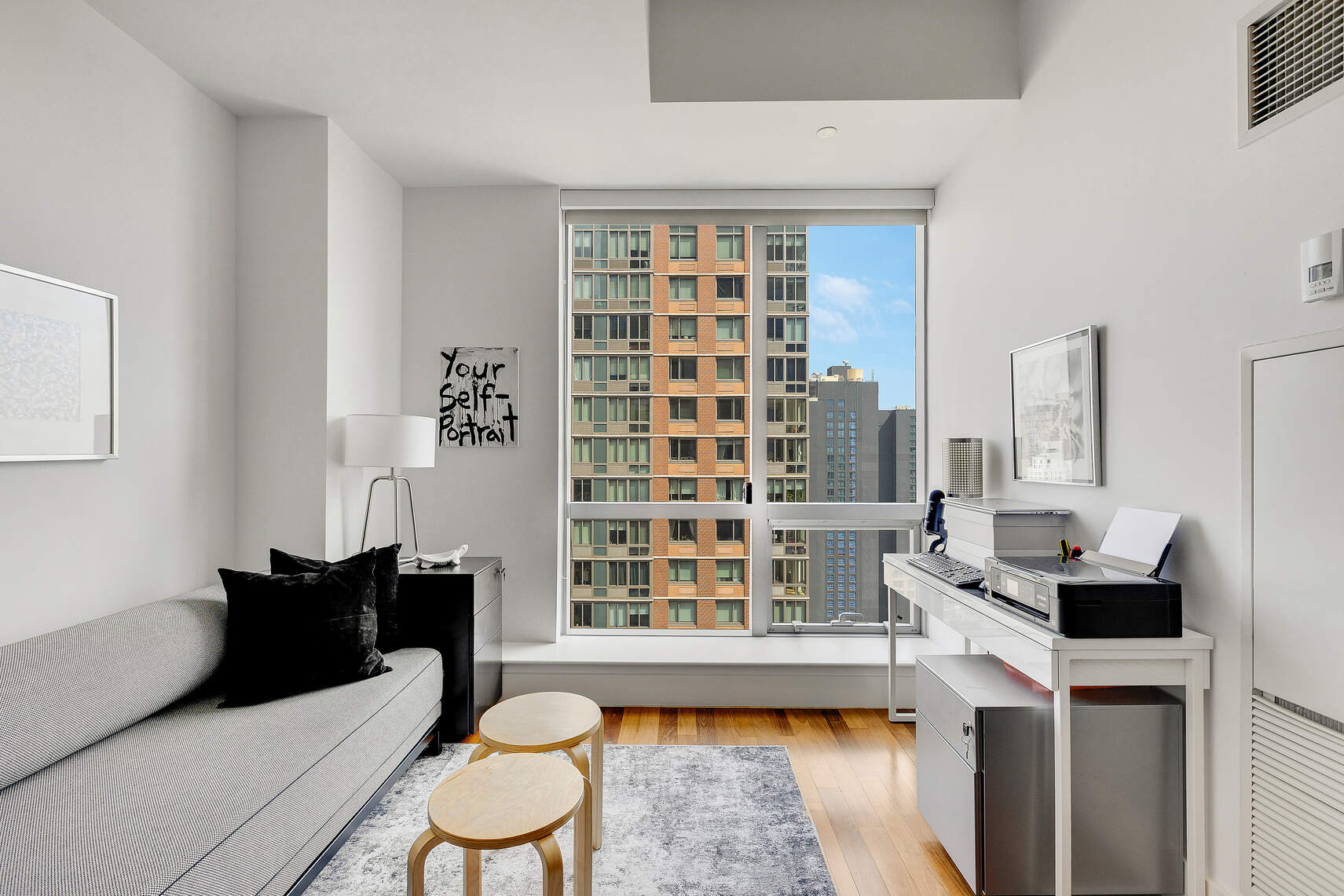 150 Myrtle Avenue, Unit 2503 Brooklyn, NY 11201 - Photo 7 of 28 a living room with furniture and a fireplace