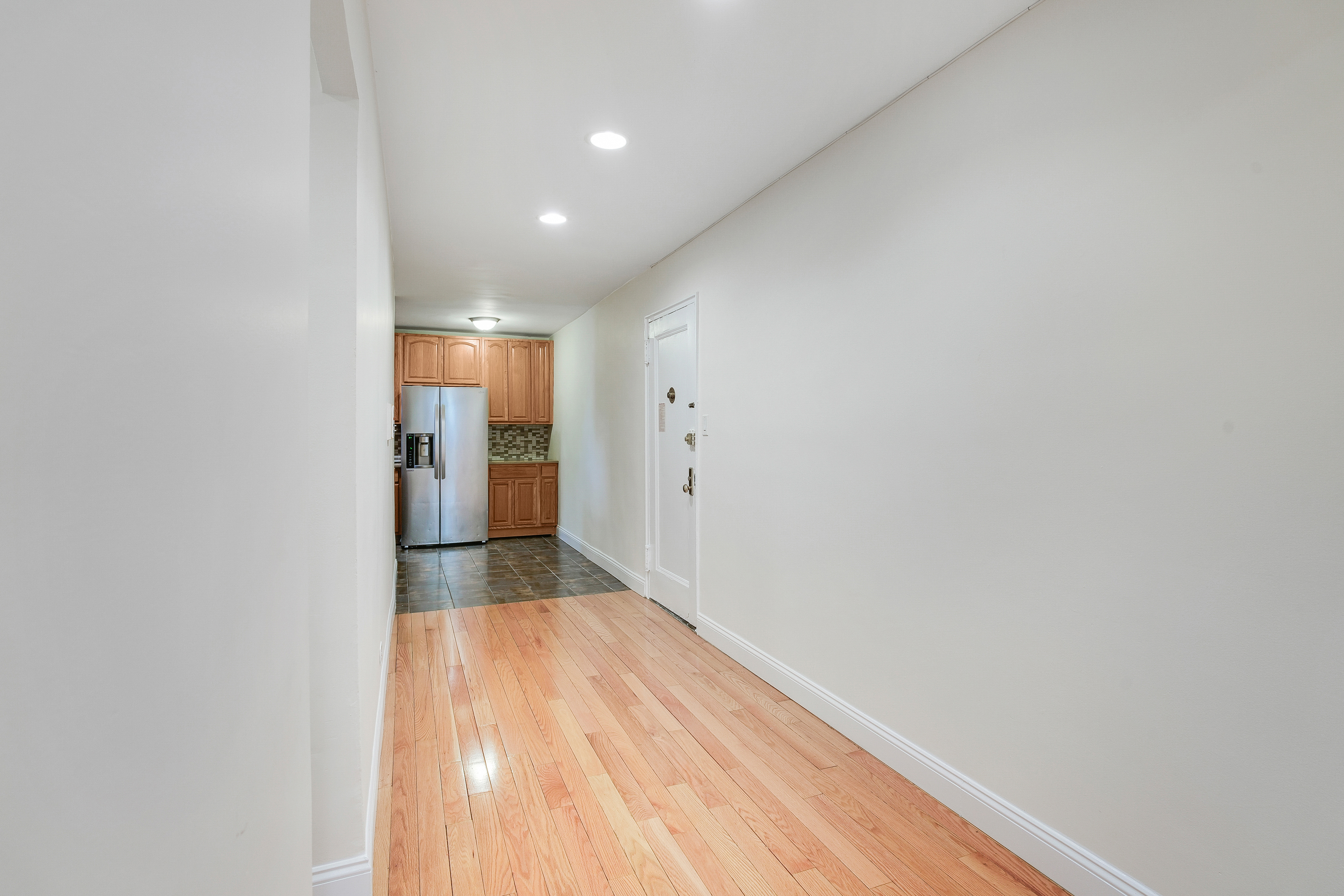 3840 Greystone Avenue, Unit 1K Bronx, NY 10463 - Photo 5 of 13 a view of hallway with a large window