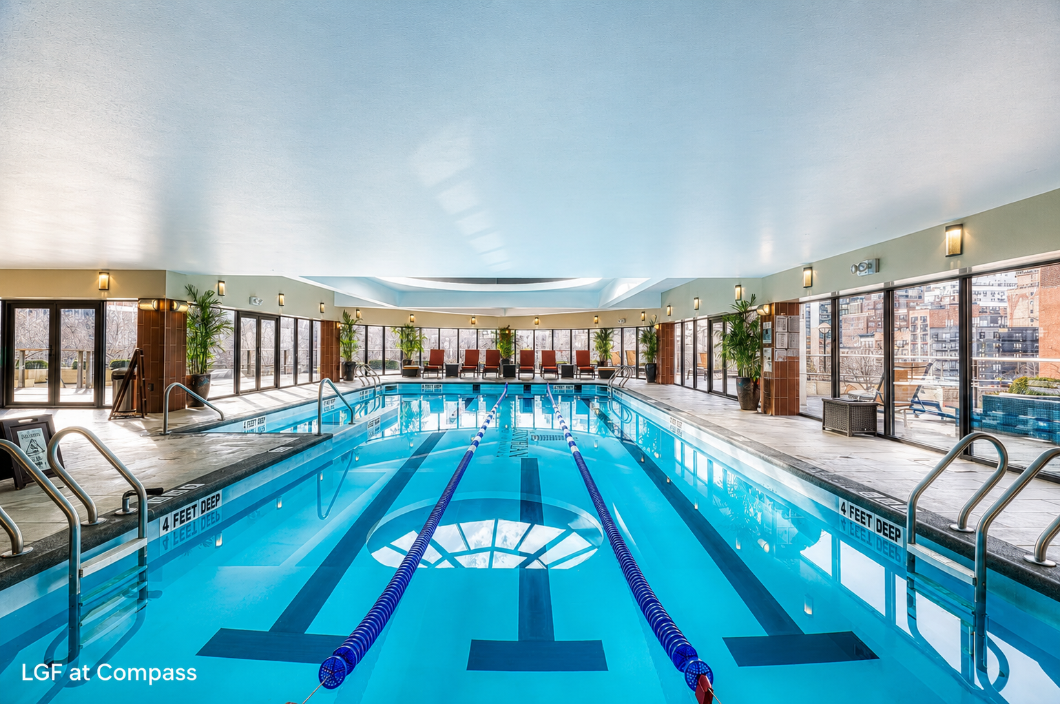 330 East 38th Street, Unit 26E Manhattan, NY 10016 - Photo 10 of 16 swimming pool with large windows and furniture