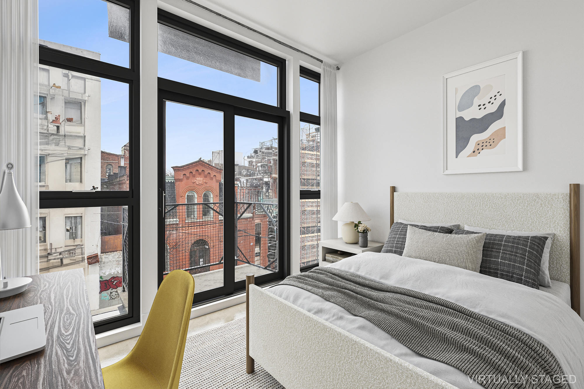 30 Belvidere Street, Unit 3A Brooklyn, NY 11206 - Photo 6 of 9 a bedroom with a large bed and a large window