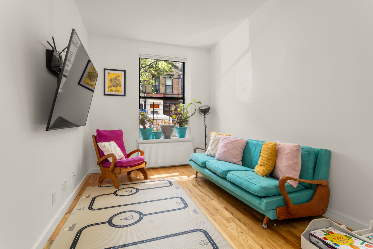 a living room with furniture and a couch