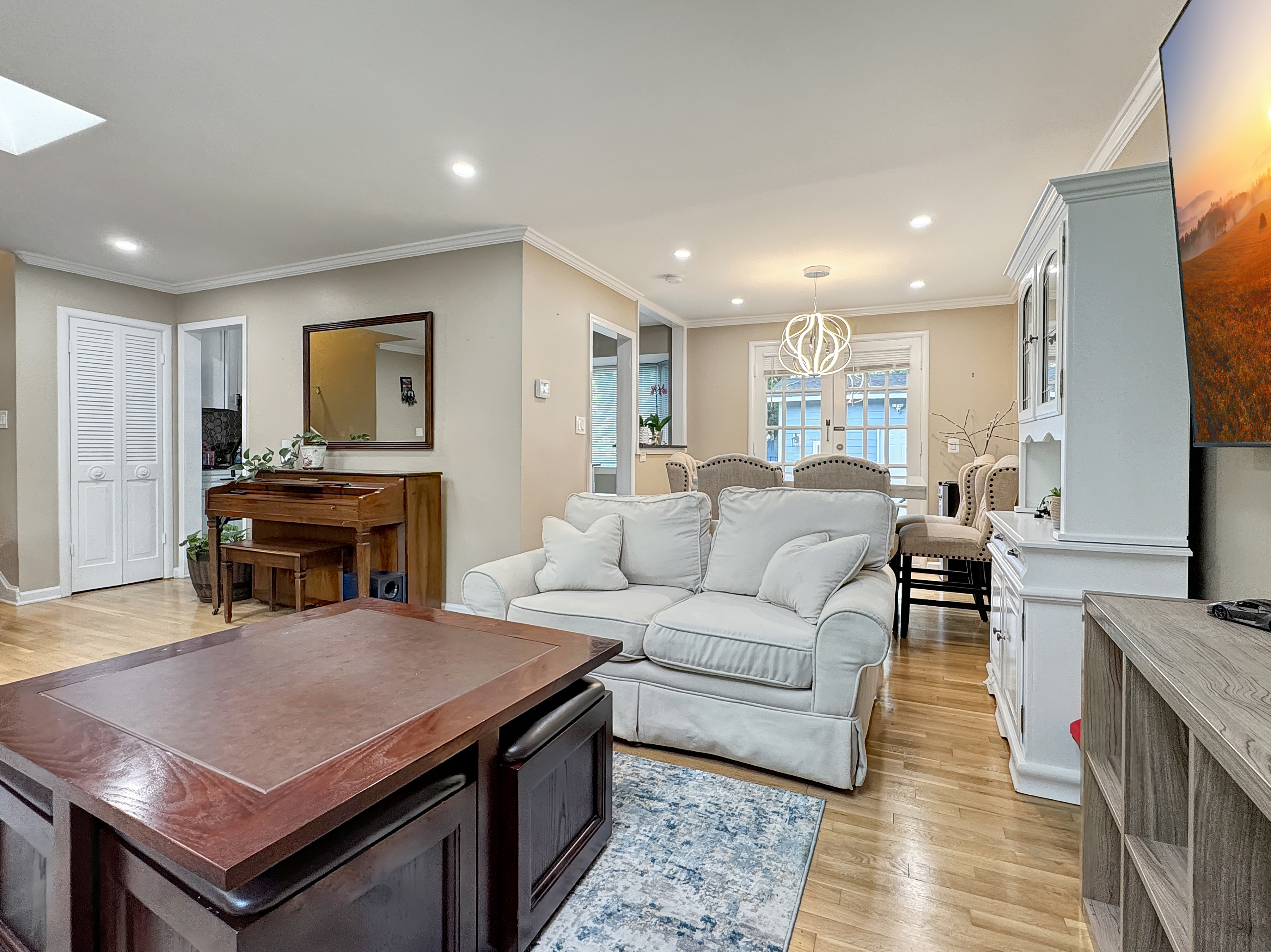 2408 Lillian Drive Silver Spring, MD 20902 - Photo 7 of 40 a living room with furniture a fireplace and a flat screen tv