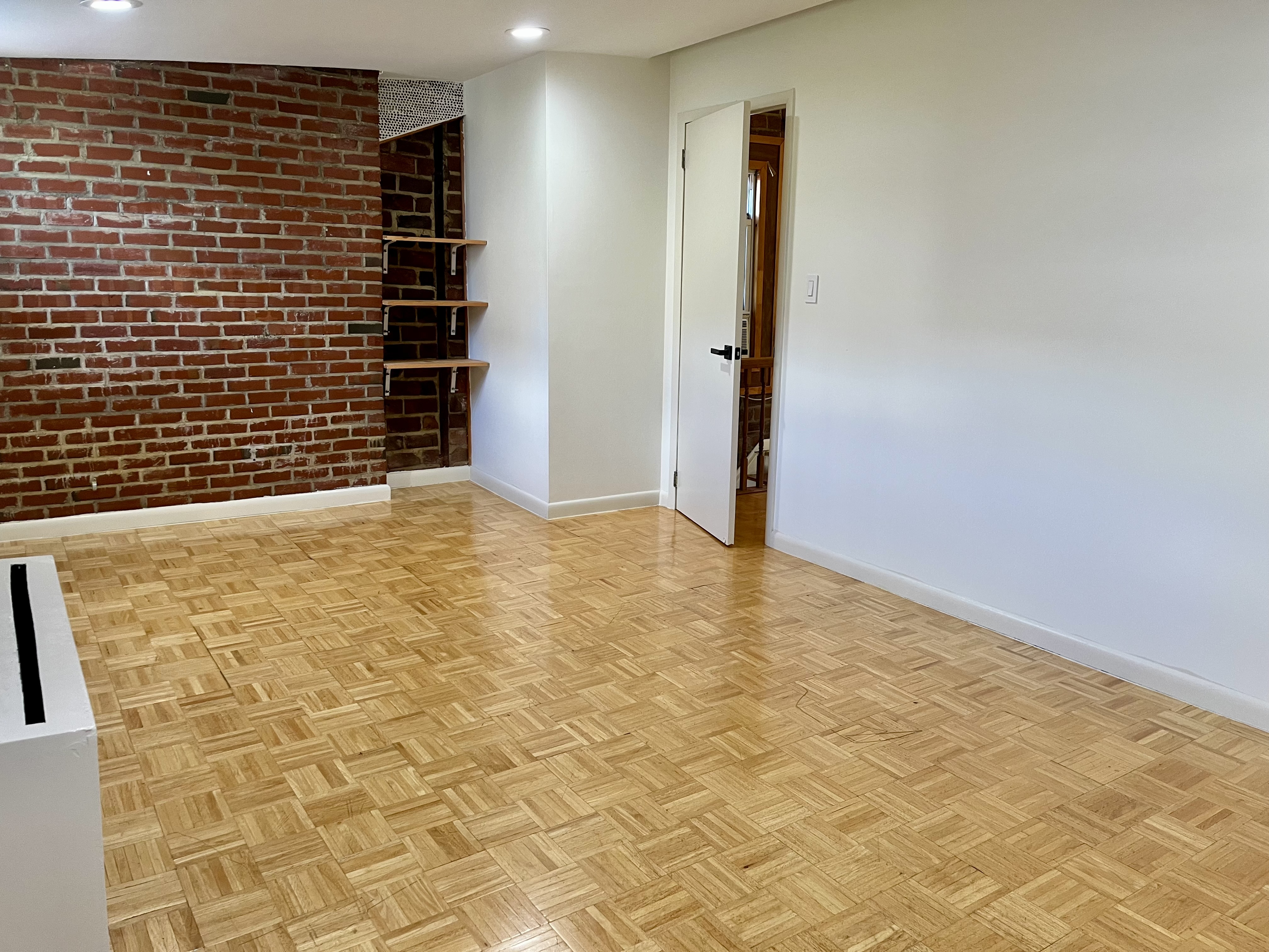 226 10th Street, Unit 3 Brooklyn, NY 11215 - Photo 4 of 10 a view of empty room with a door