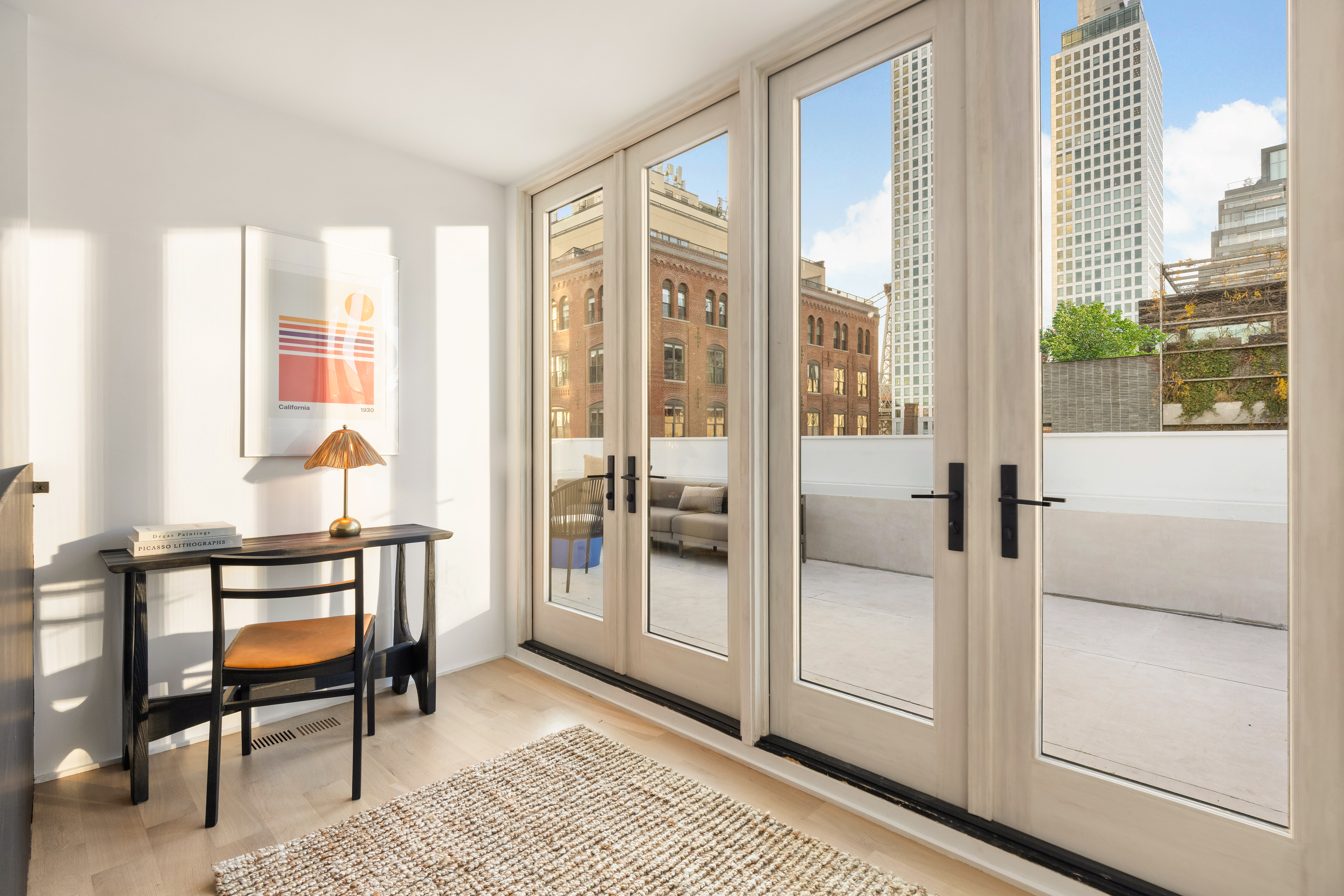 61 South 4th Street Brooklyn, NY 11249 - Photo 23 of 29 a view of a bedroom with furniture and windows