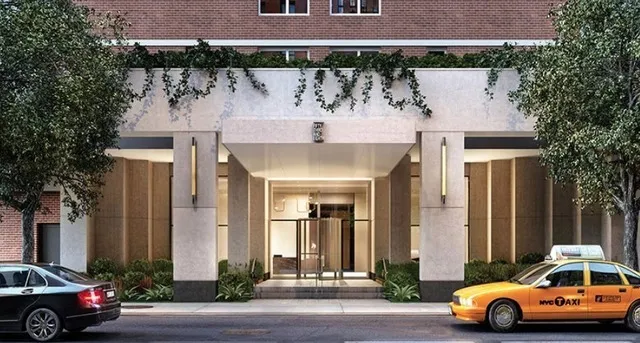 a front view of a house with parking area