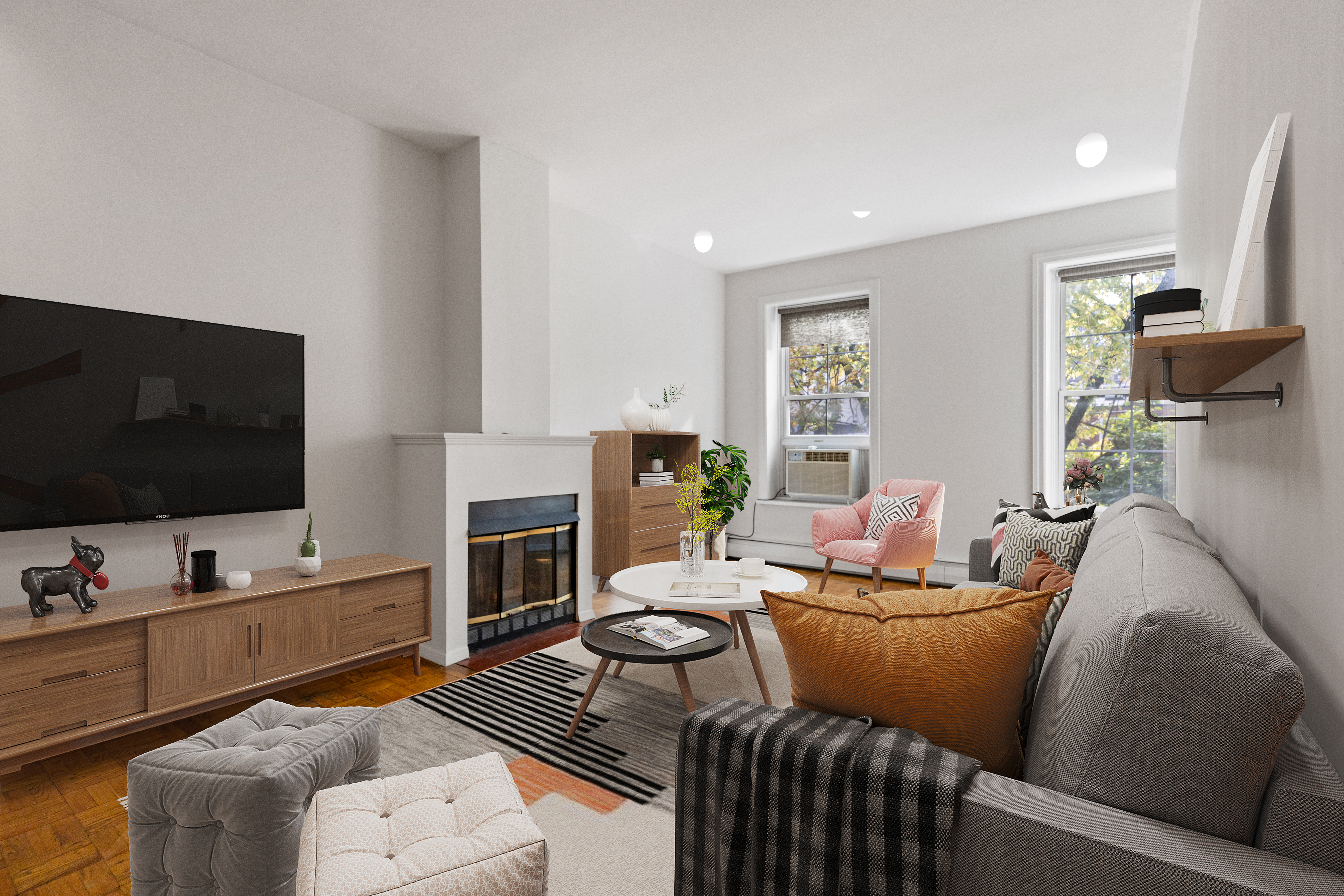 136 East 30th Street, Unit 3R Manhattan, NY 10016 - Photo 5 of 23 a living room with furniture and a flat screen tv