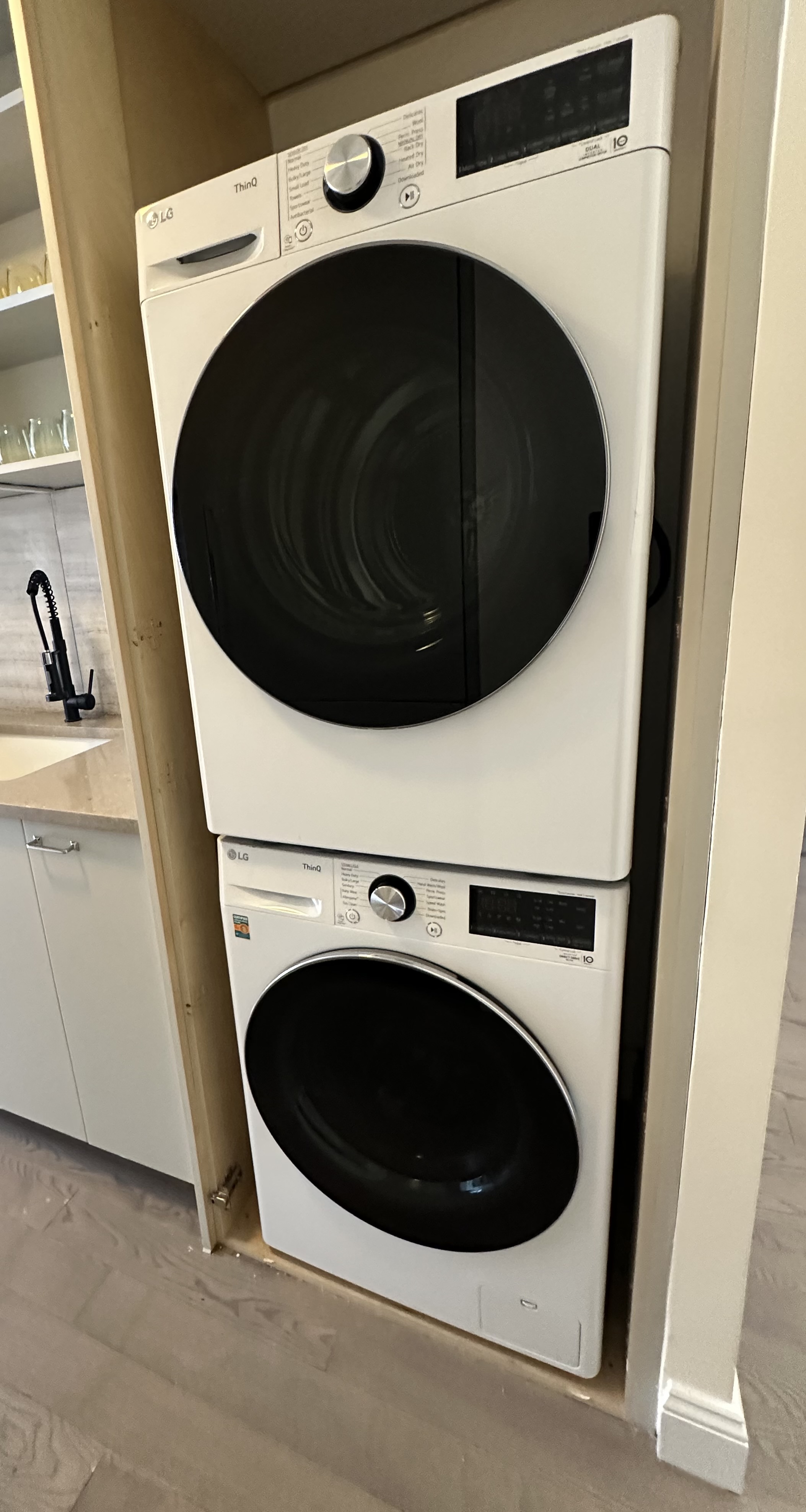 100 West 93rd Street, Unit 11J Manhattan, NY 10025 - Photo 11 of 13 a utility room with dryer and washer