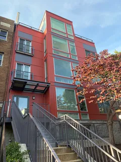 a view of a building from a balcony