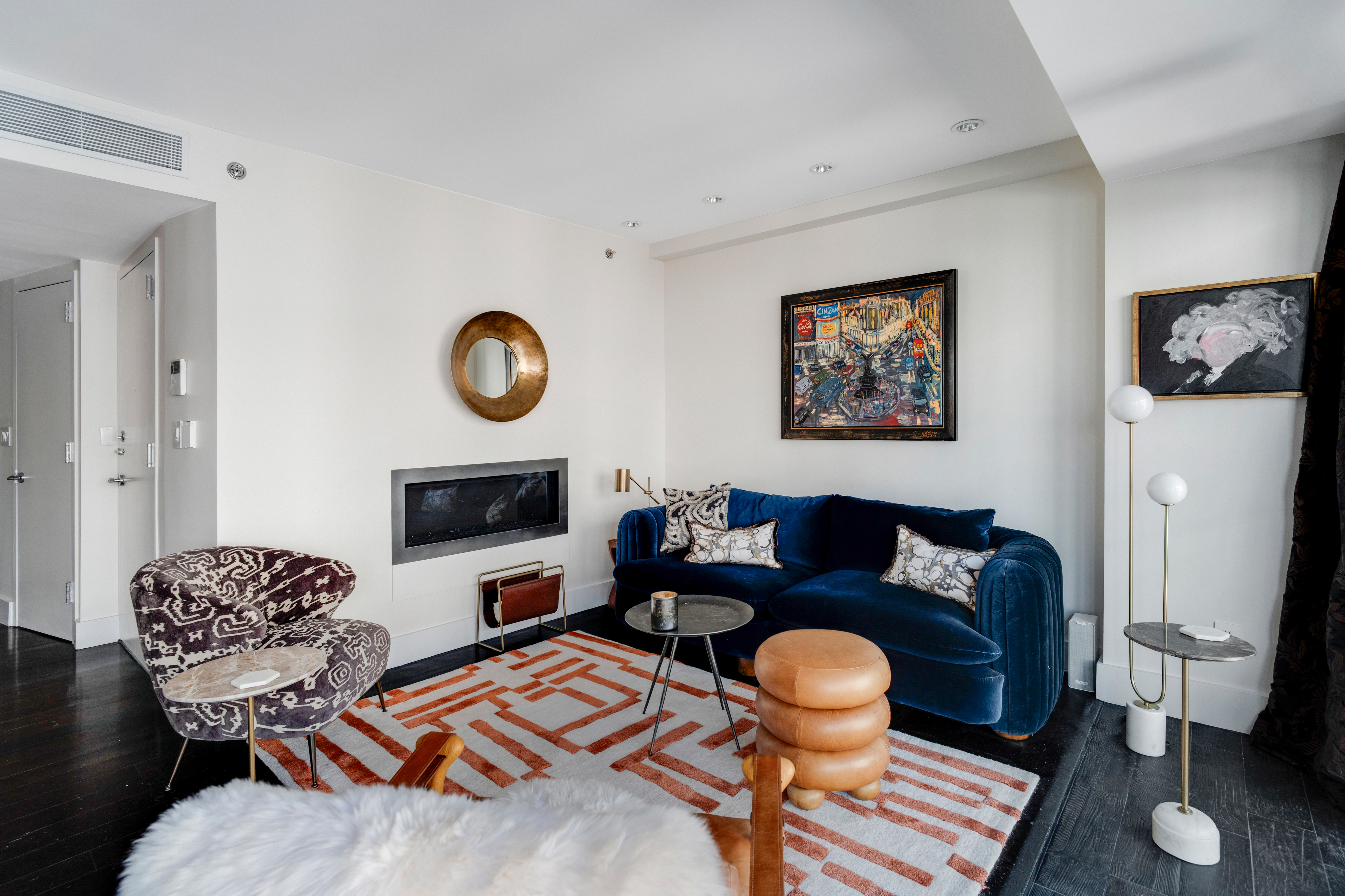 60 Orchard Street, Unit 4 Manhattan, NY 10002 - Photo 5 of 18 a living room with furniture and a fireplace