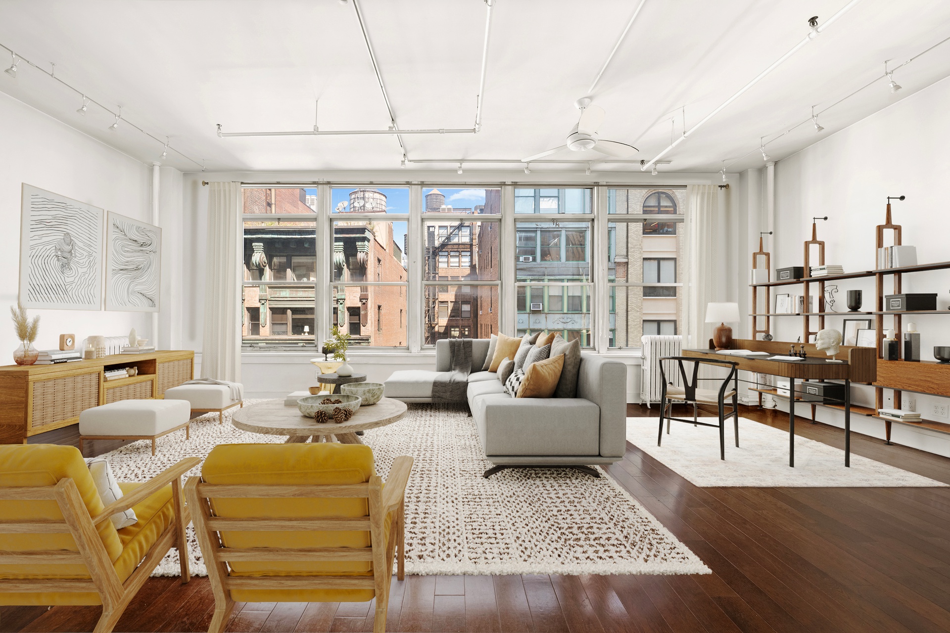 12 West 17th Street, Unit 9 Manhattan, NY 10011 - Photo 2 of 9 a living room with furniture and a large window