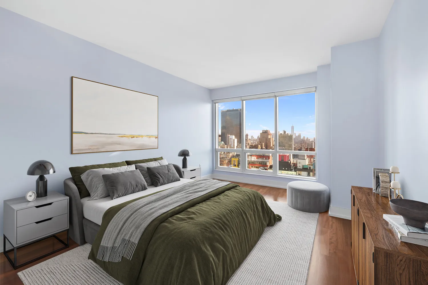 a bedroom with a large bed and a window