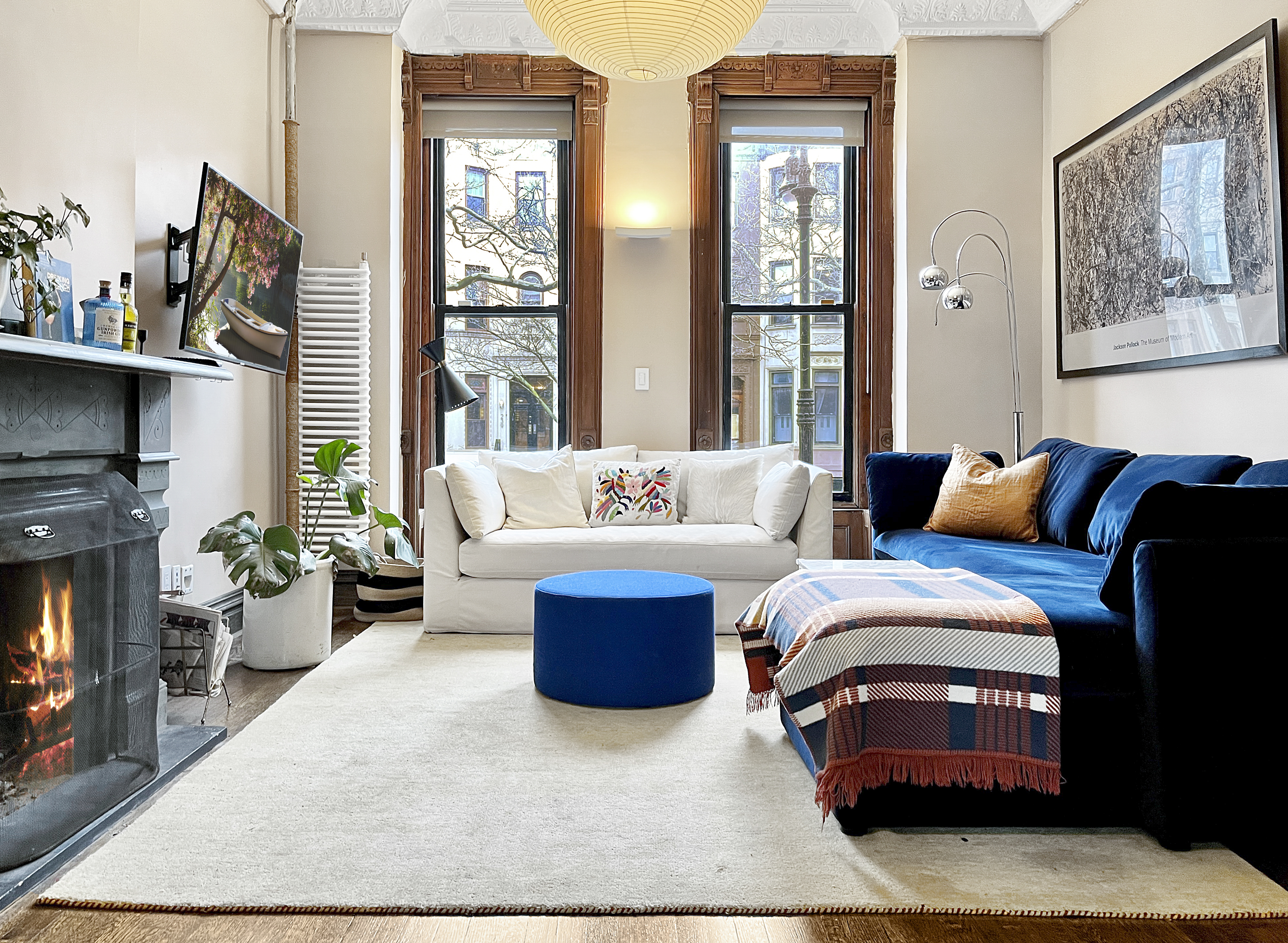 252 Stuyvesant Avenue Brooklyn, NY 11221 - Photo 7 of 26 a living room with furniture and a fireplace