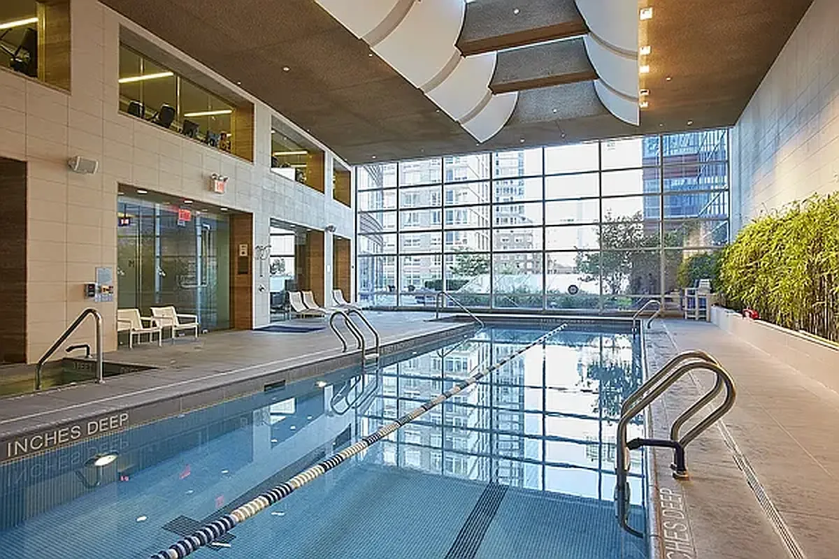 70 Little West Street, Unit 15A Manhattan, NY 10004 - Photo 13 of 19 a very nice looking dining room with a table and chairs