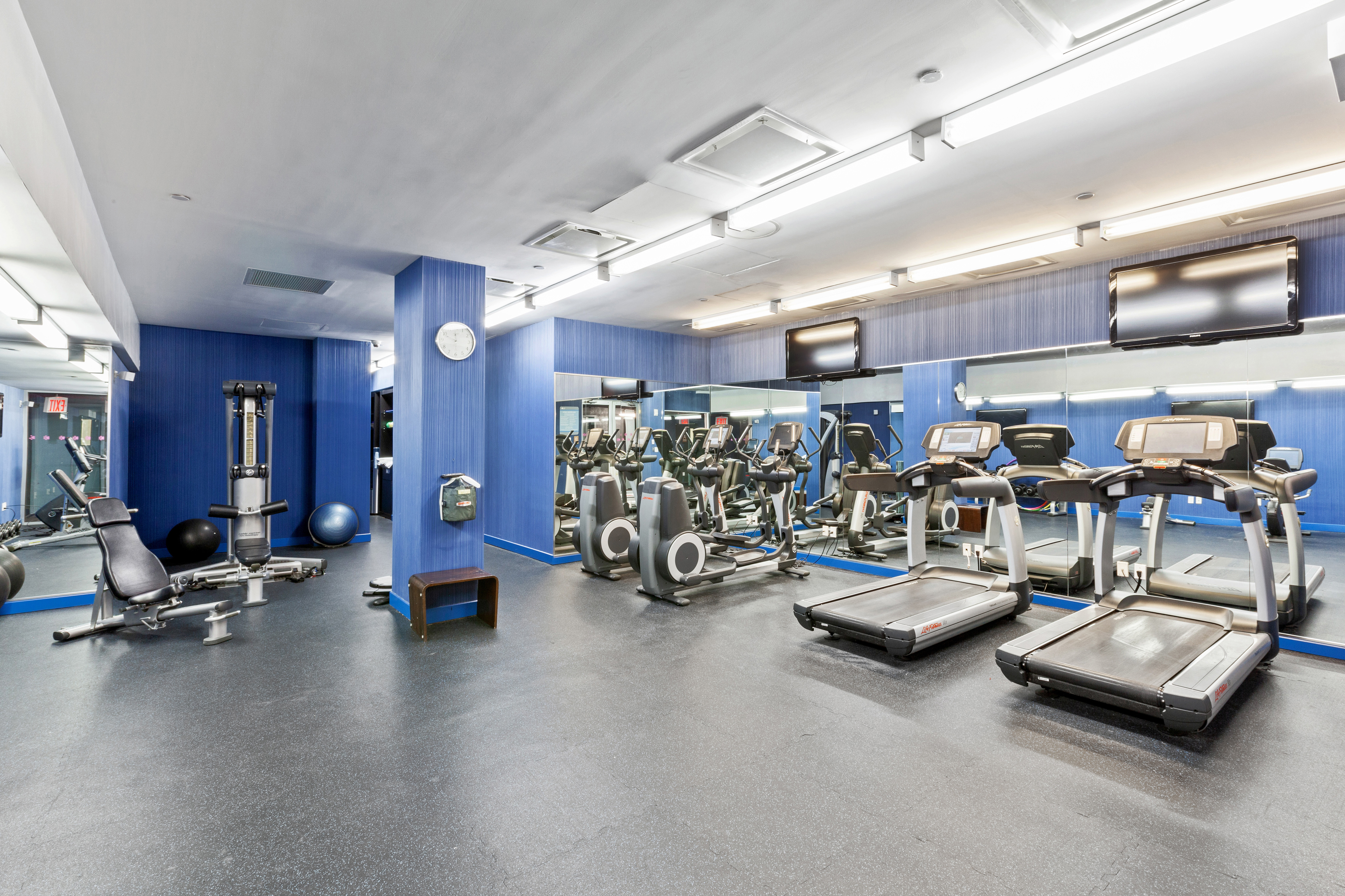 2300 Frederick Douglass Boulevard, Unit 8D Manhattan, NY 10027 - Photo 9 of 11 a view of a room with gym equipment